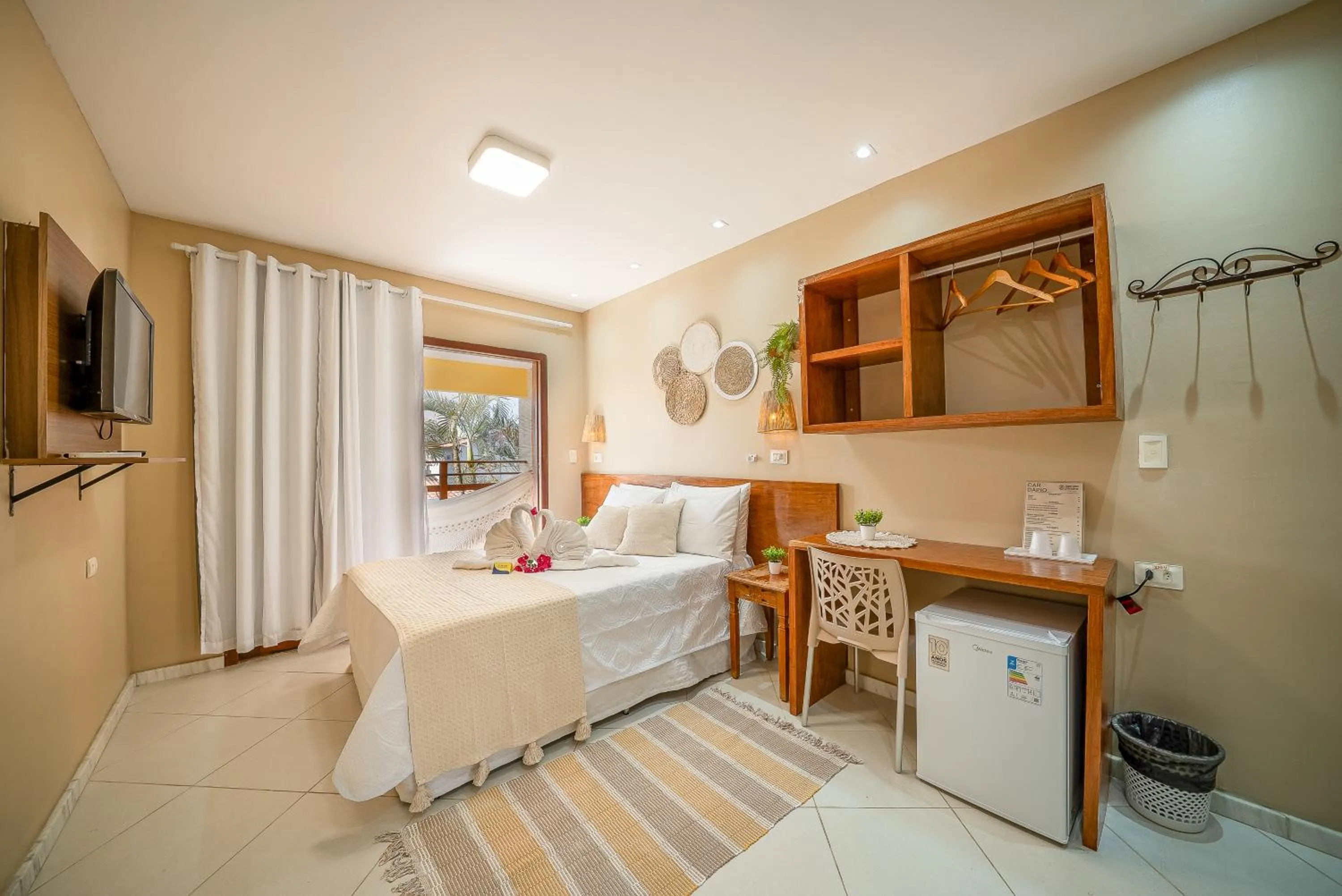 Bed in Pousada Som dos Pássaros