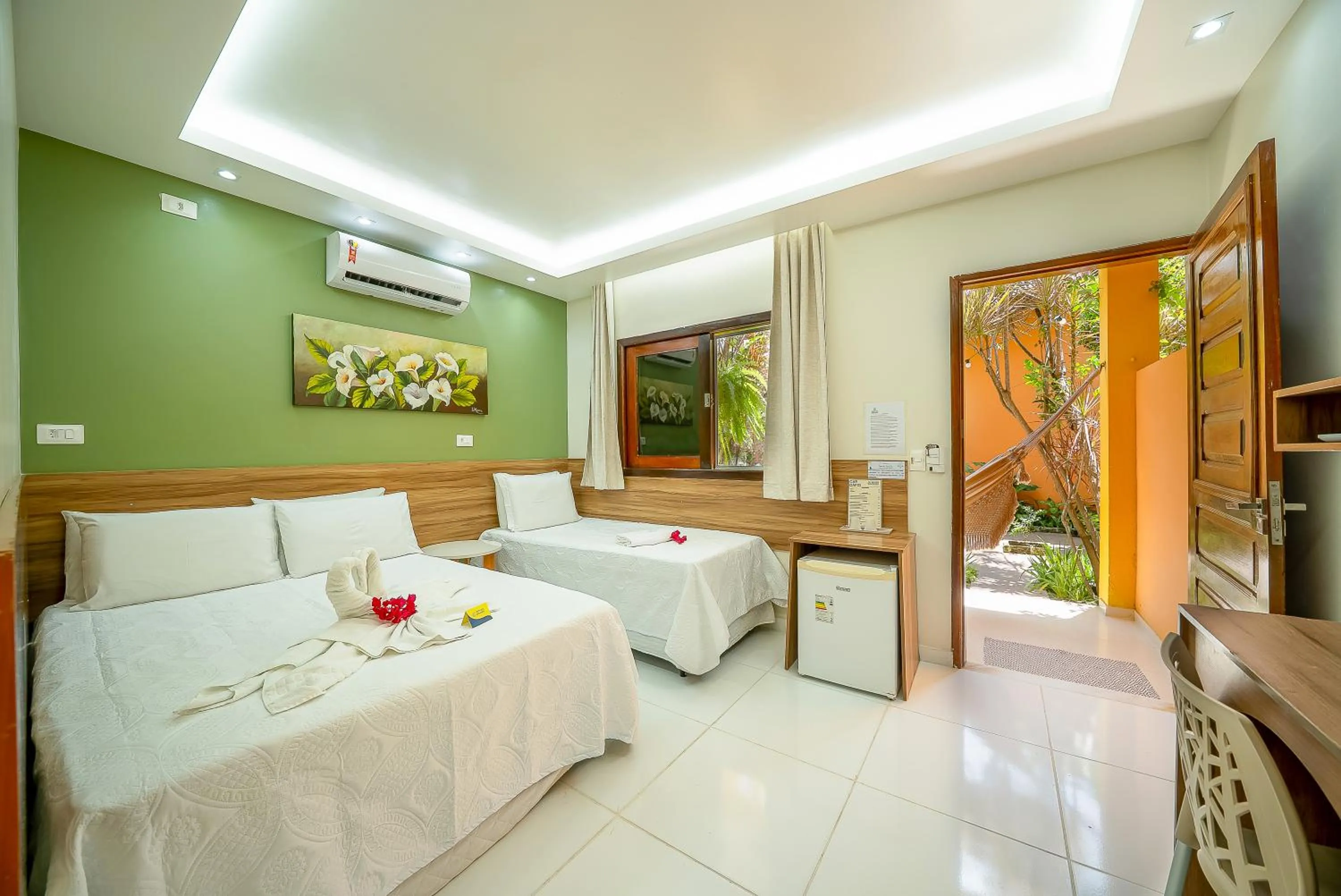 Bed in Pousada Som dos Pássaros