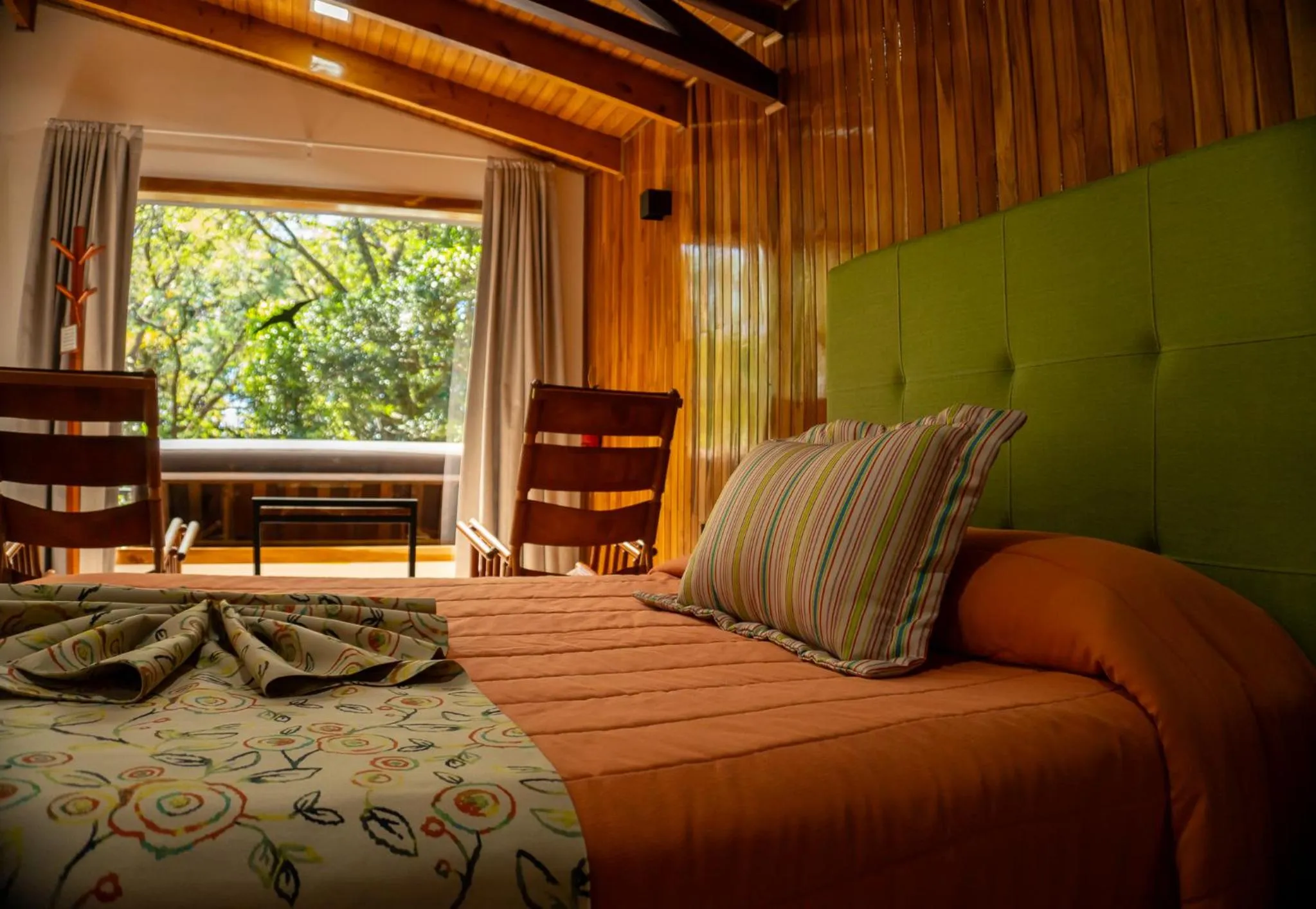 Bed in Los Pinos Cabins & Reserve