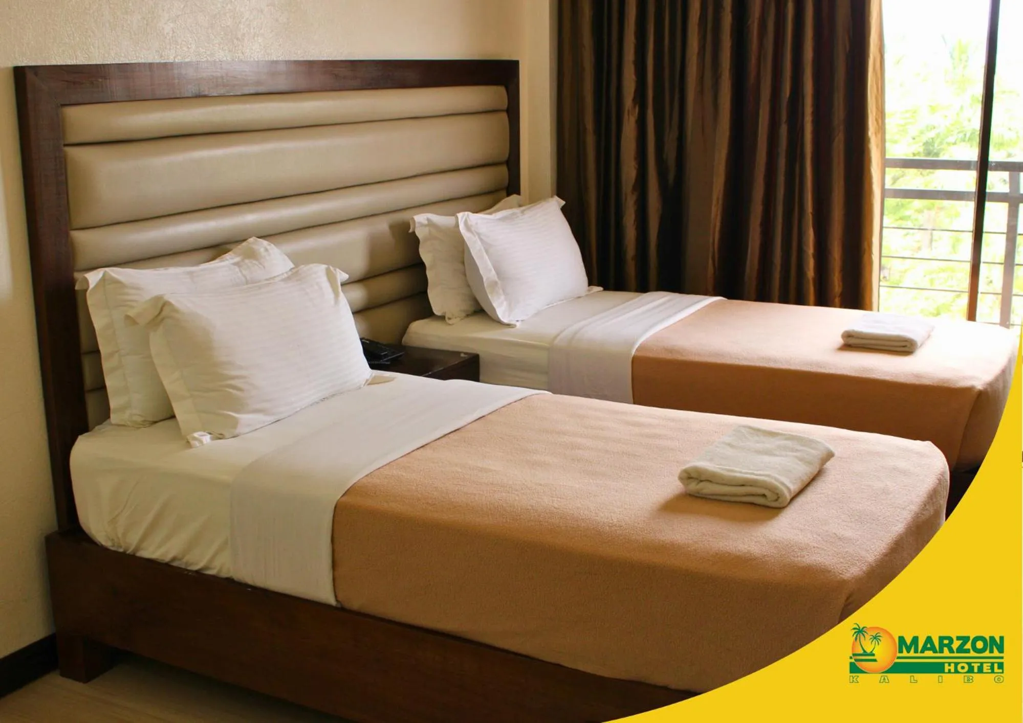 Bed in MARZON HOTEL KALIBO