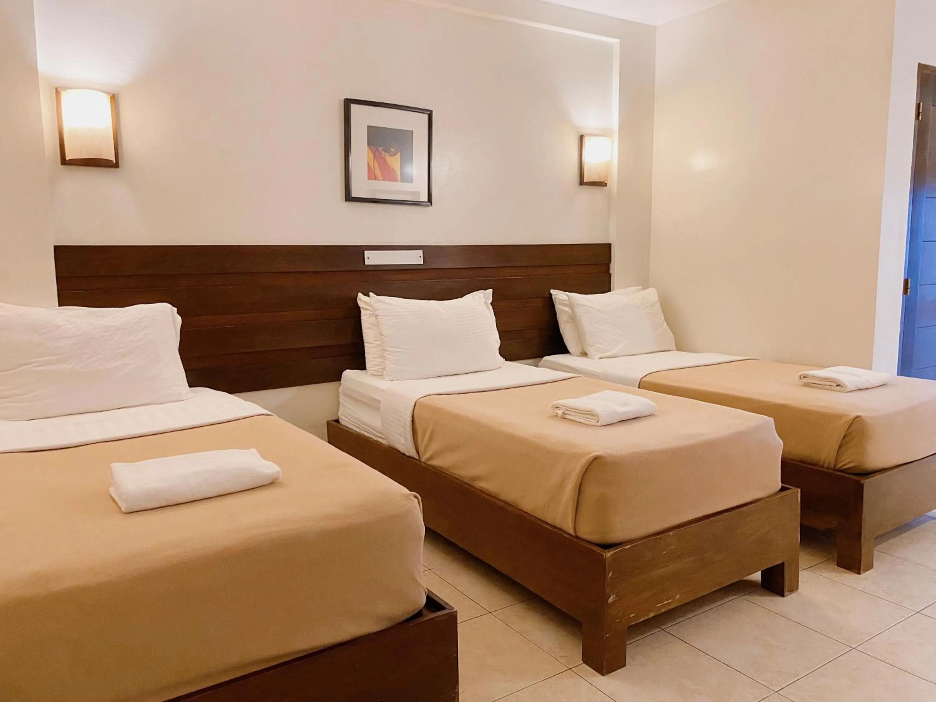 Bed in MARZON HOTEL KALIBO