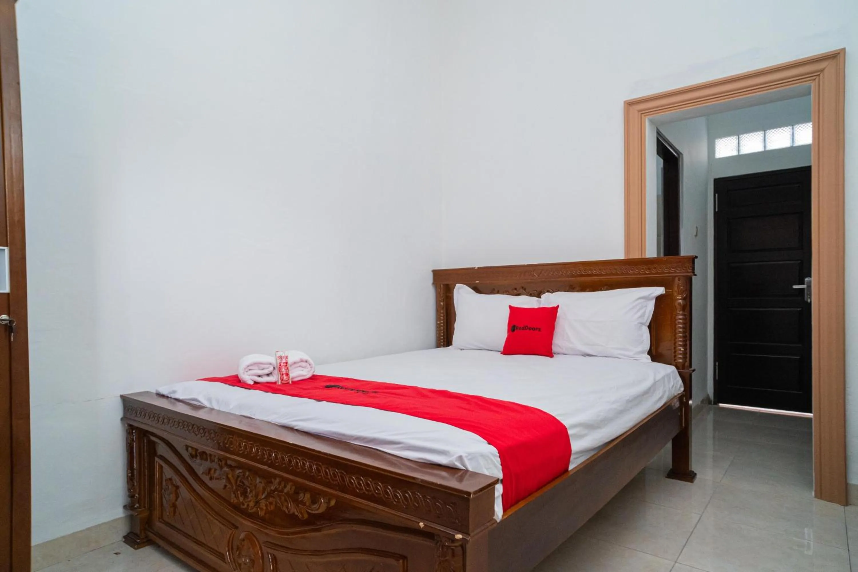 Bed in RedDoorz Syariah @ Jalan Tingang Palangkaraya