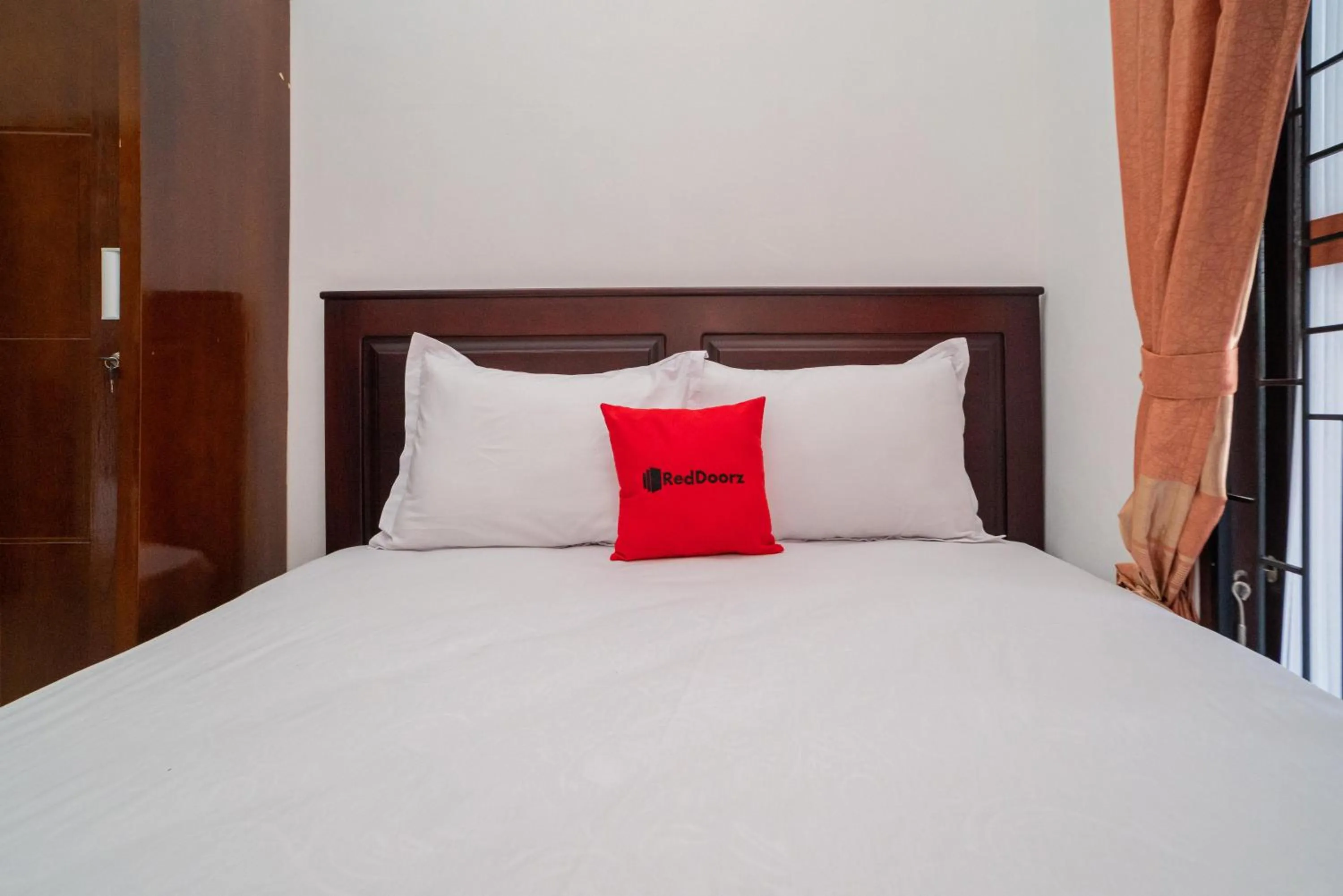 Bed in RedDoorz Syariah @ Jalan Tingang Palangkaraya