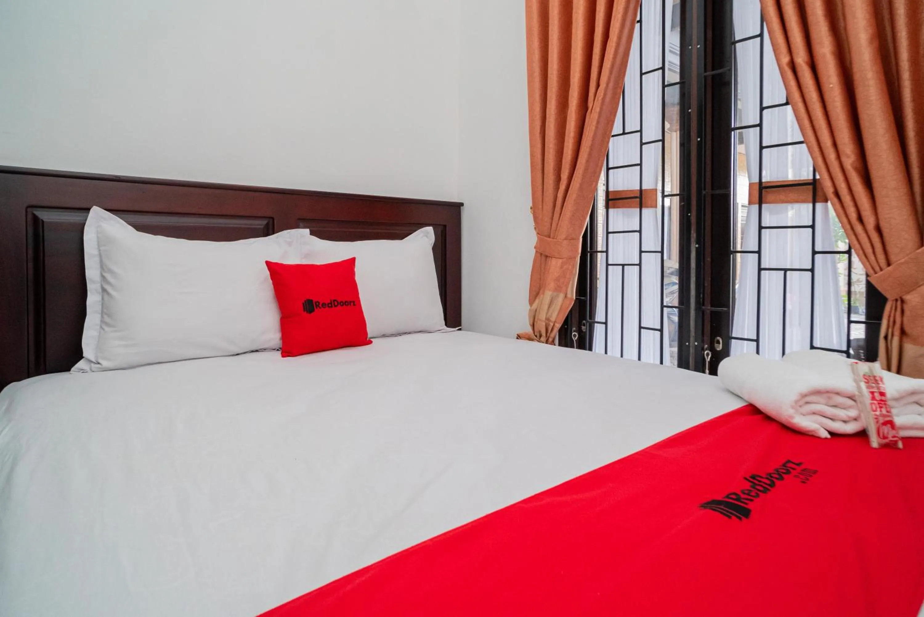 Bed in RedDoorz Syariah @ Jalan Tingang Palangkaraya