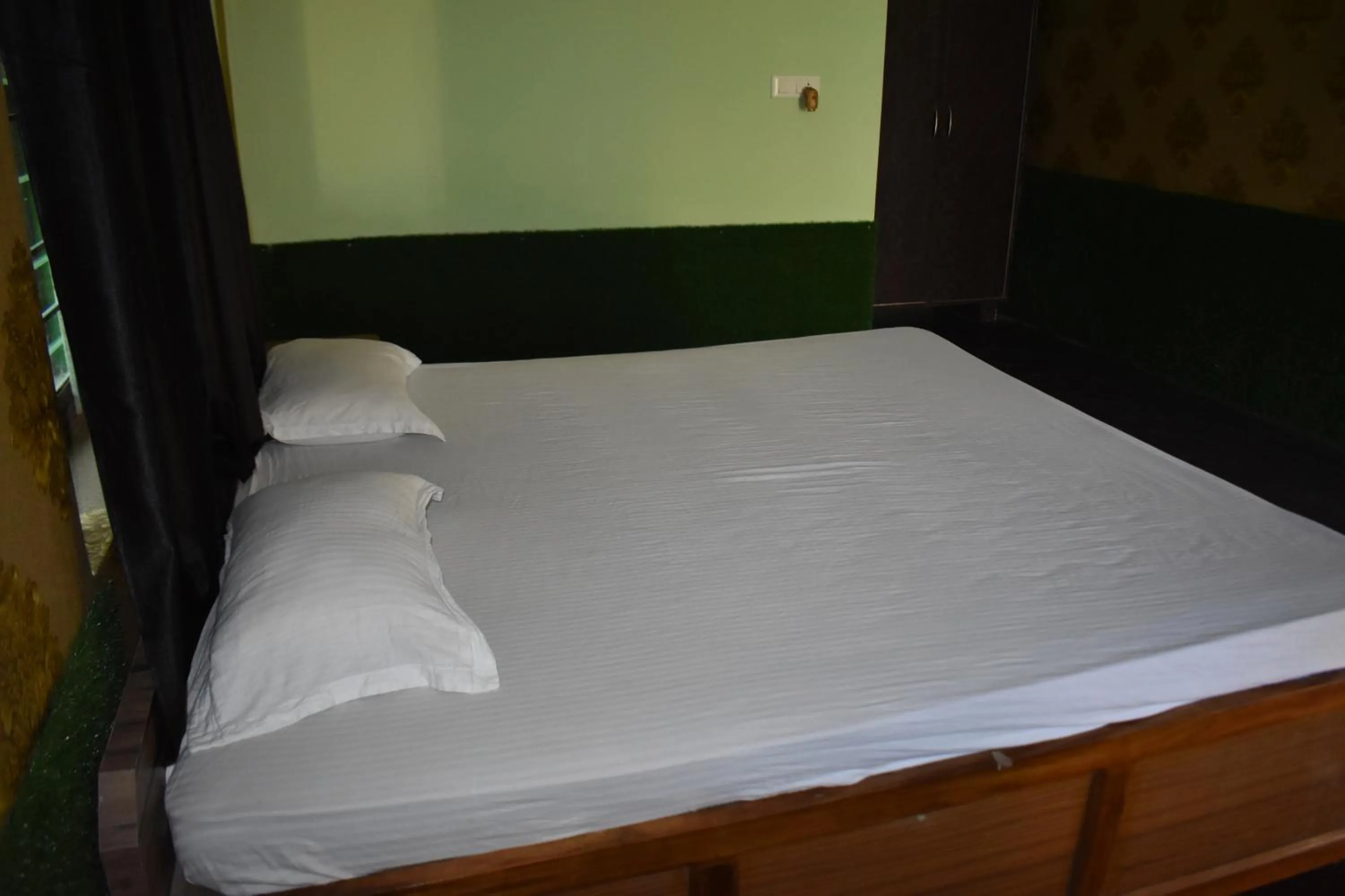 Bed in Kanikasundari Home Stay