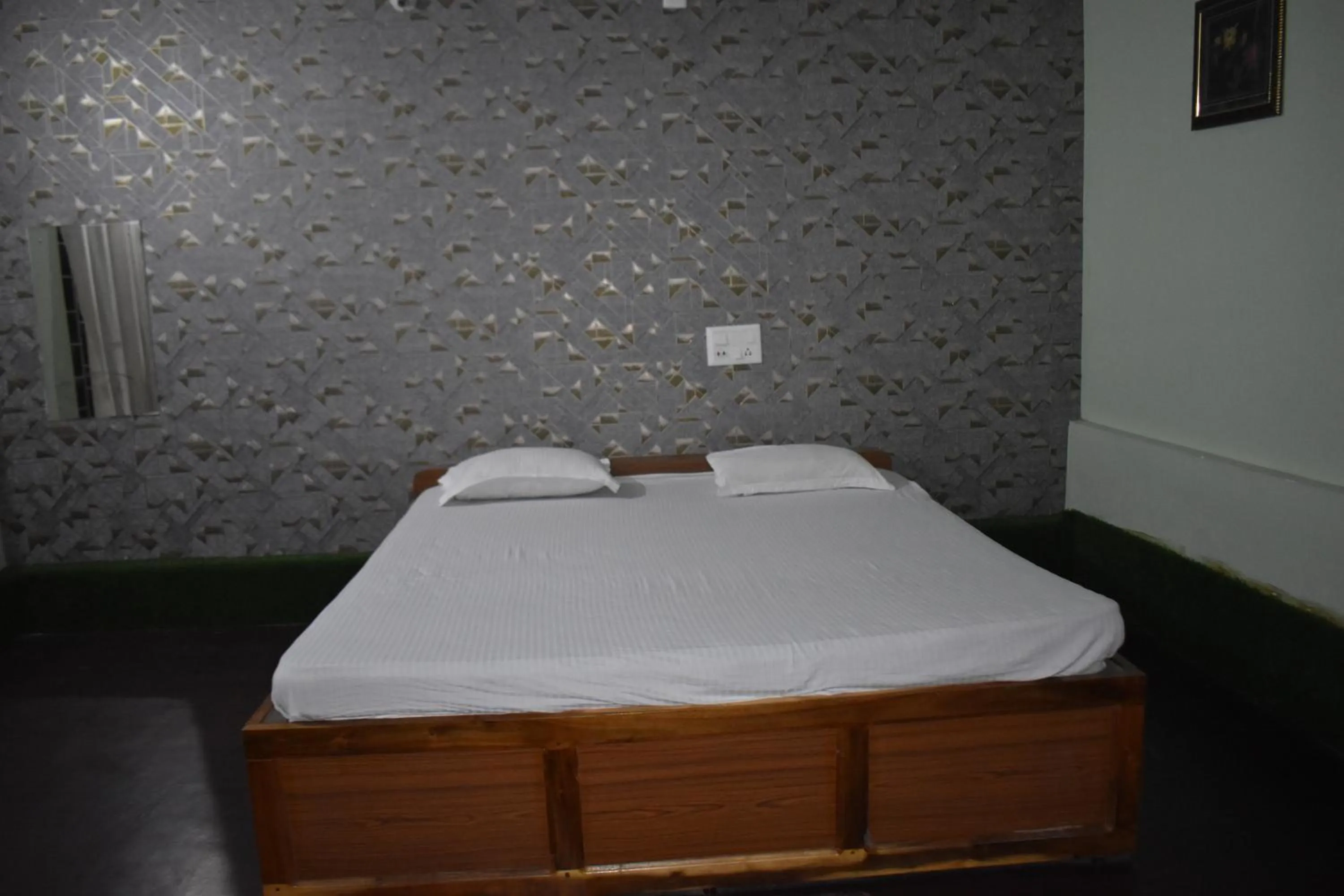 Bed in Kanikasundari Home Stay