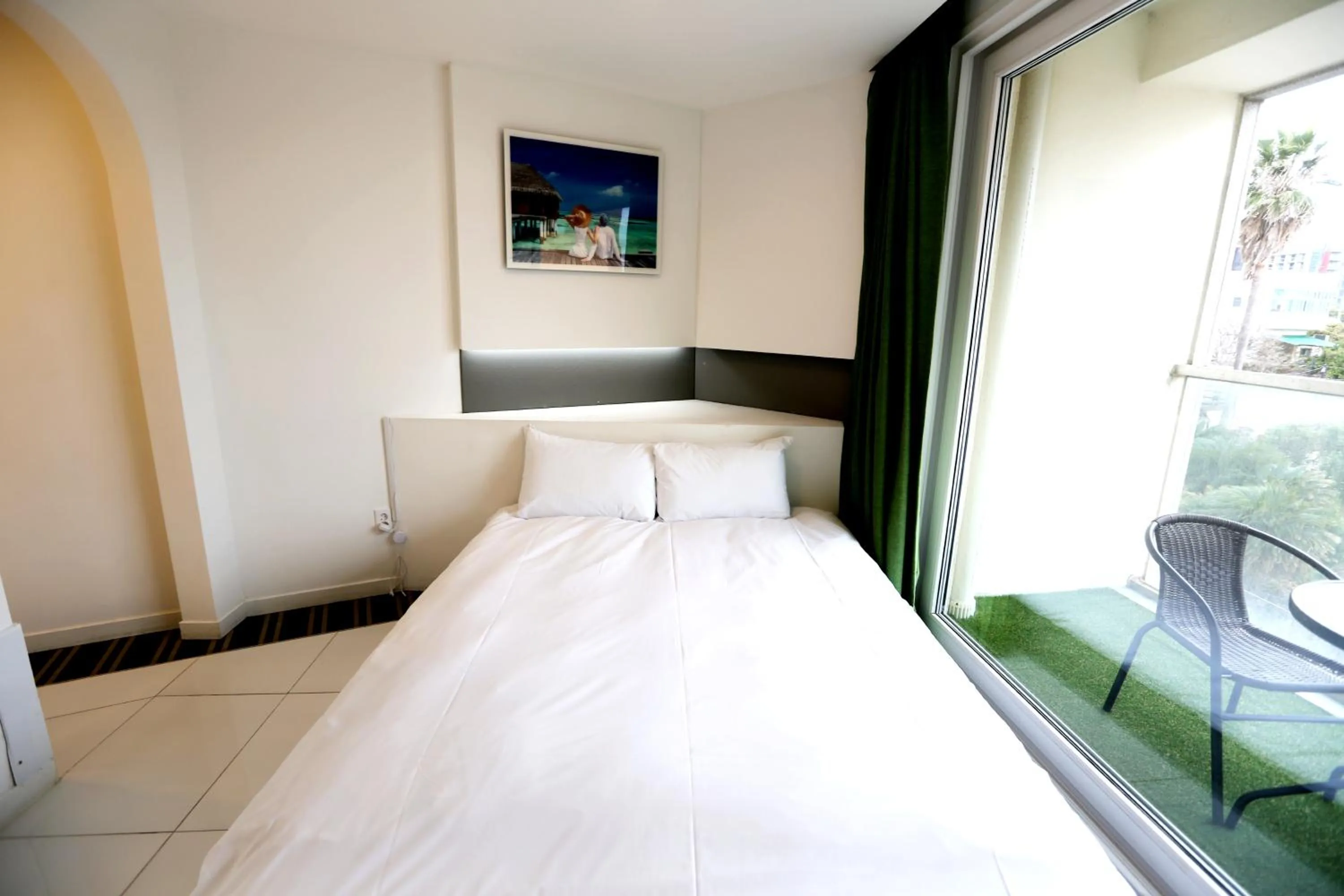 Bed in Hamdeok Beach Stay Jeju