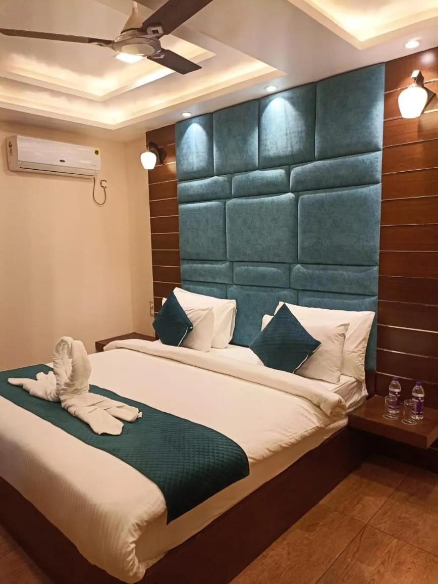 Bed in HOTEL VIVAAN REGENCY