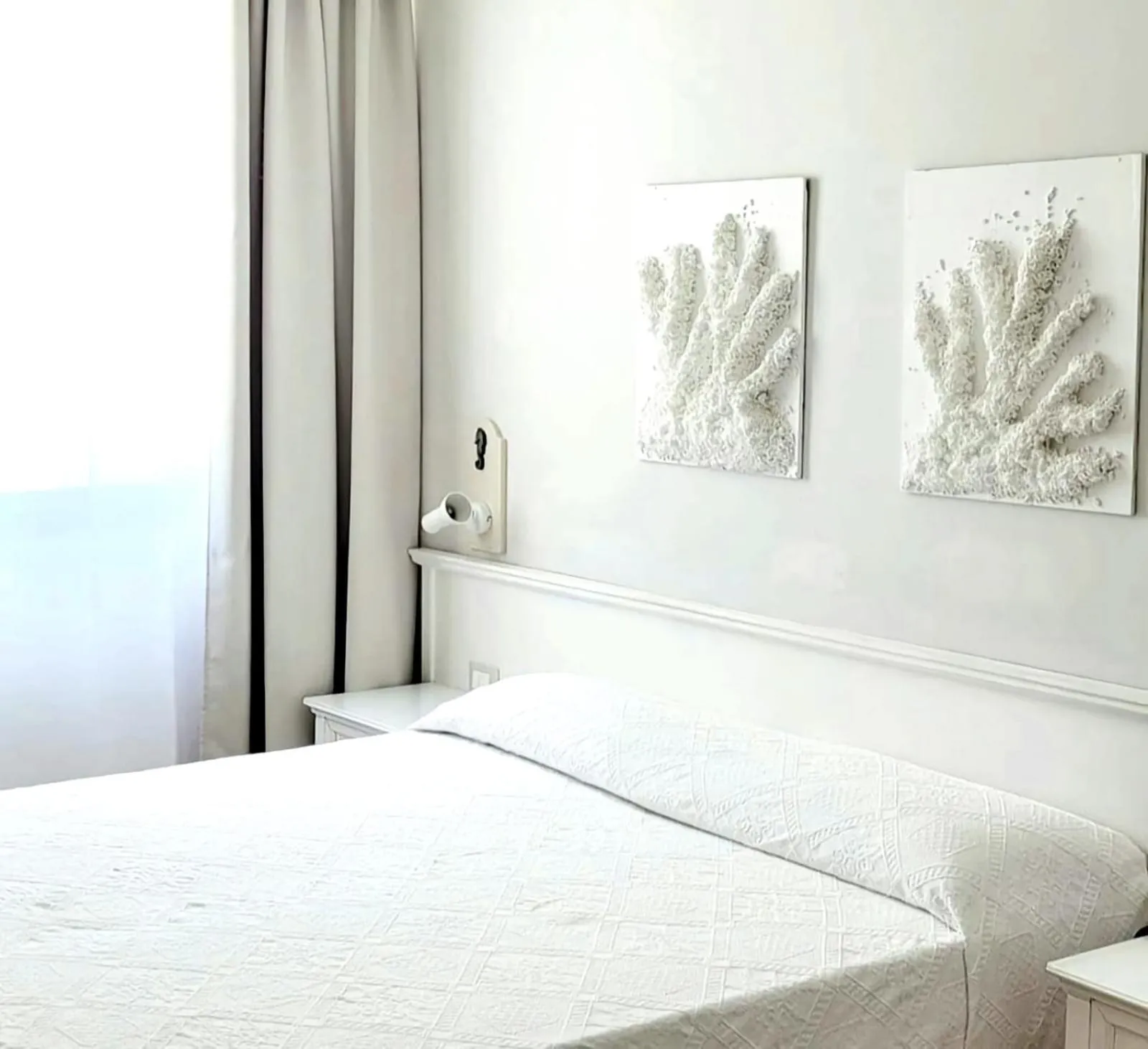 Bed in Hotel Acquamarina