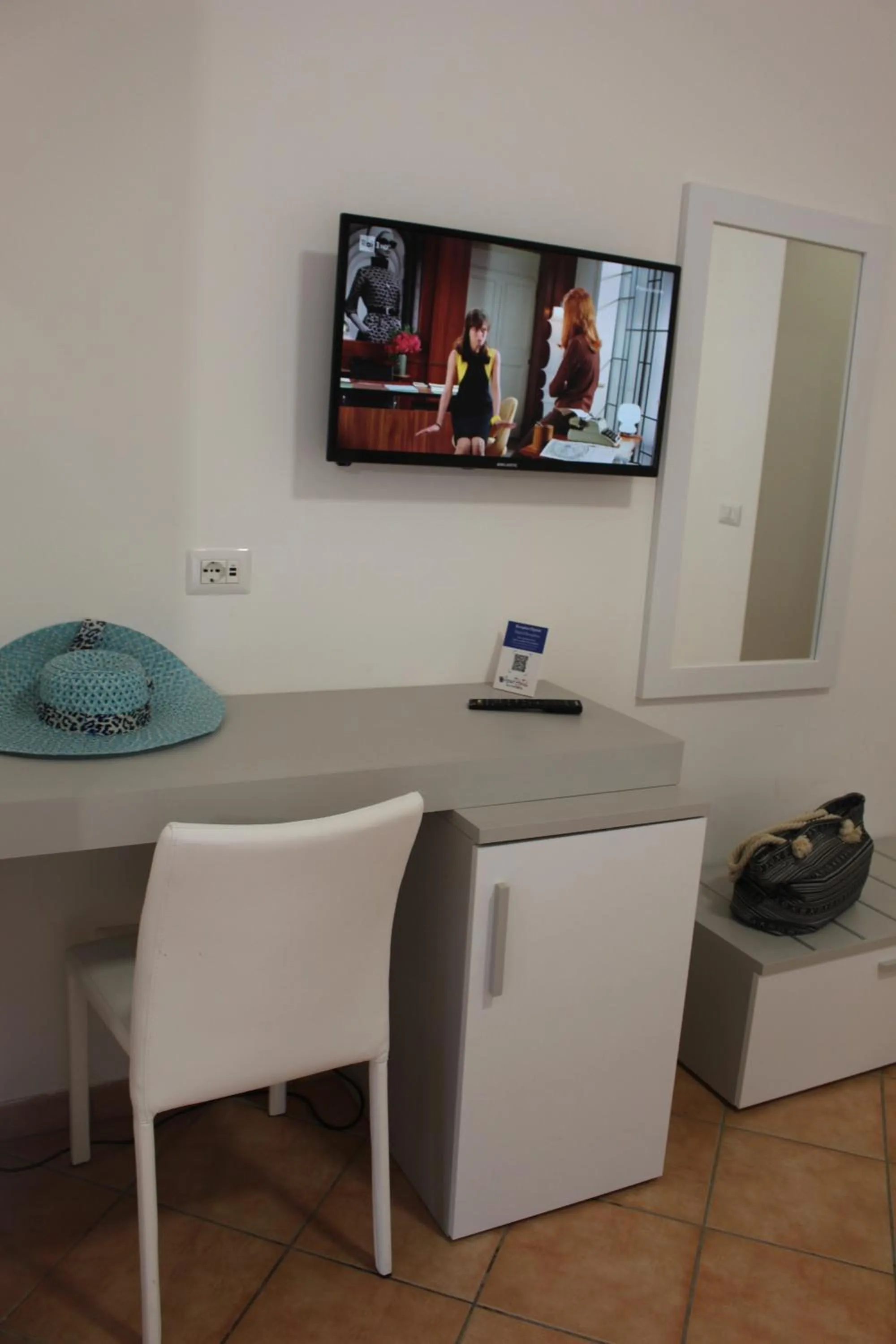 TV and multimedia in Residence Hotel La Taverna