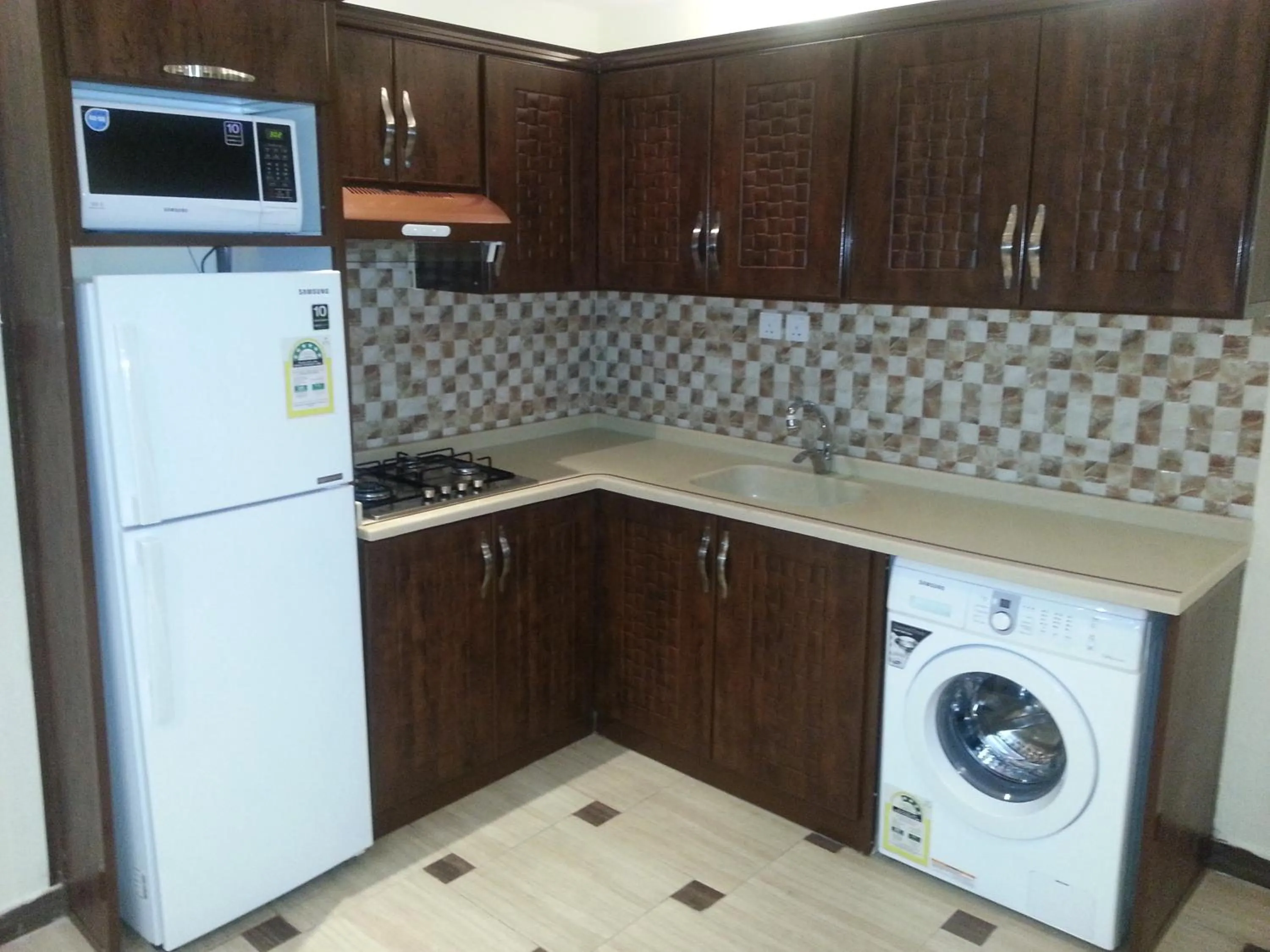 Kitchen or kitchenette in Dorar Darea Serviced Apartments - Al Malqa
