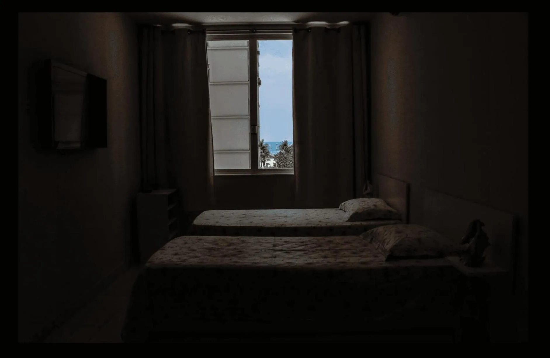 Bed in Copacabana Vista Mar Studio