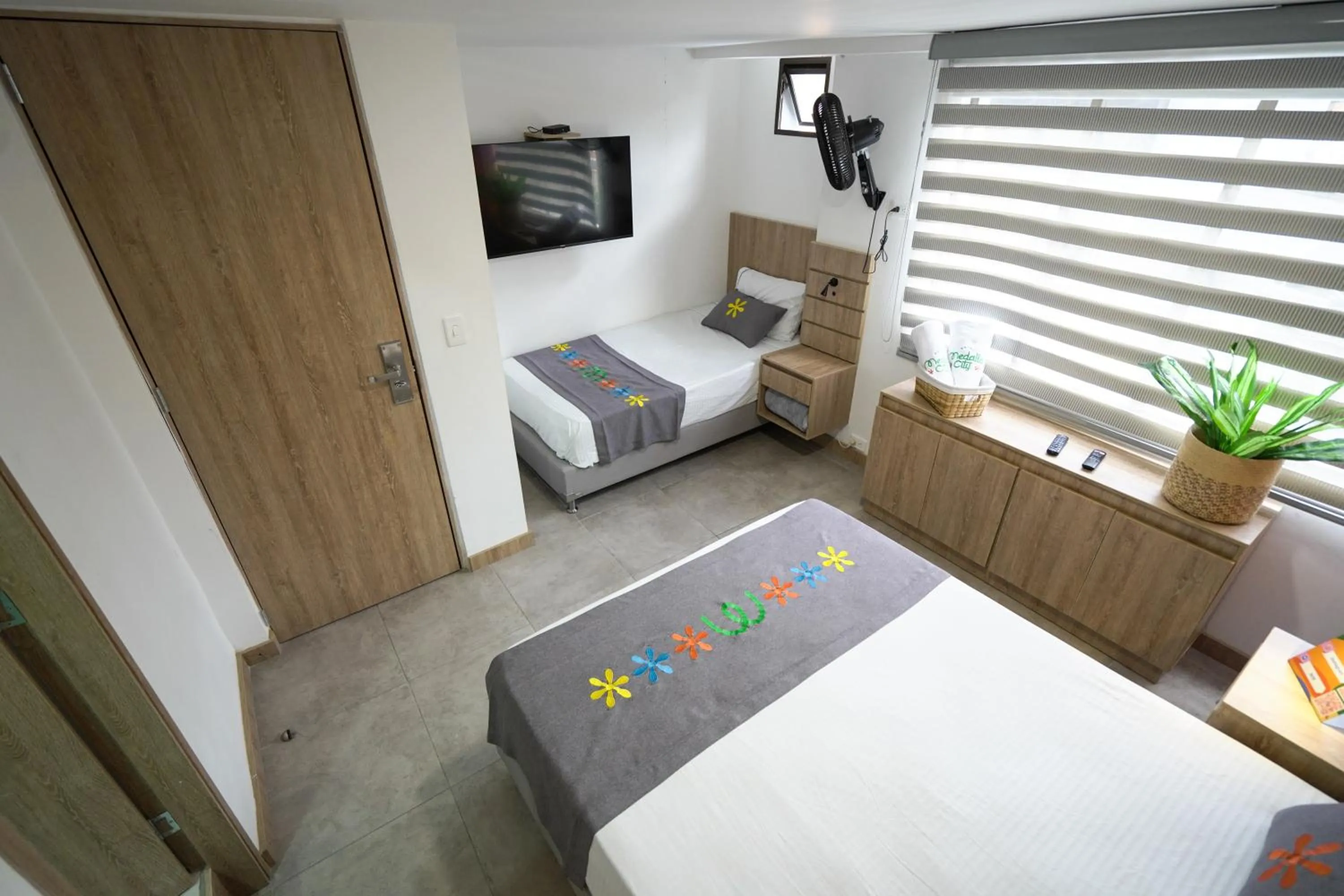 Bed in Hotel Medallo City