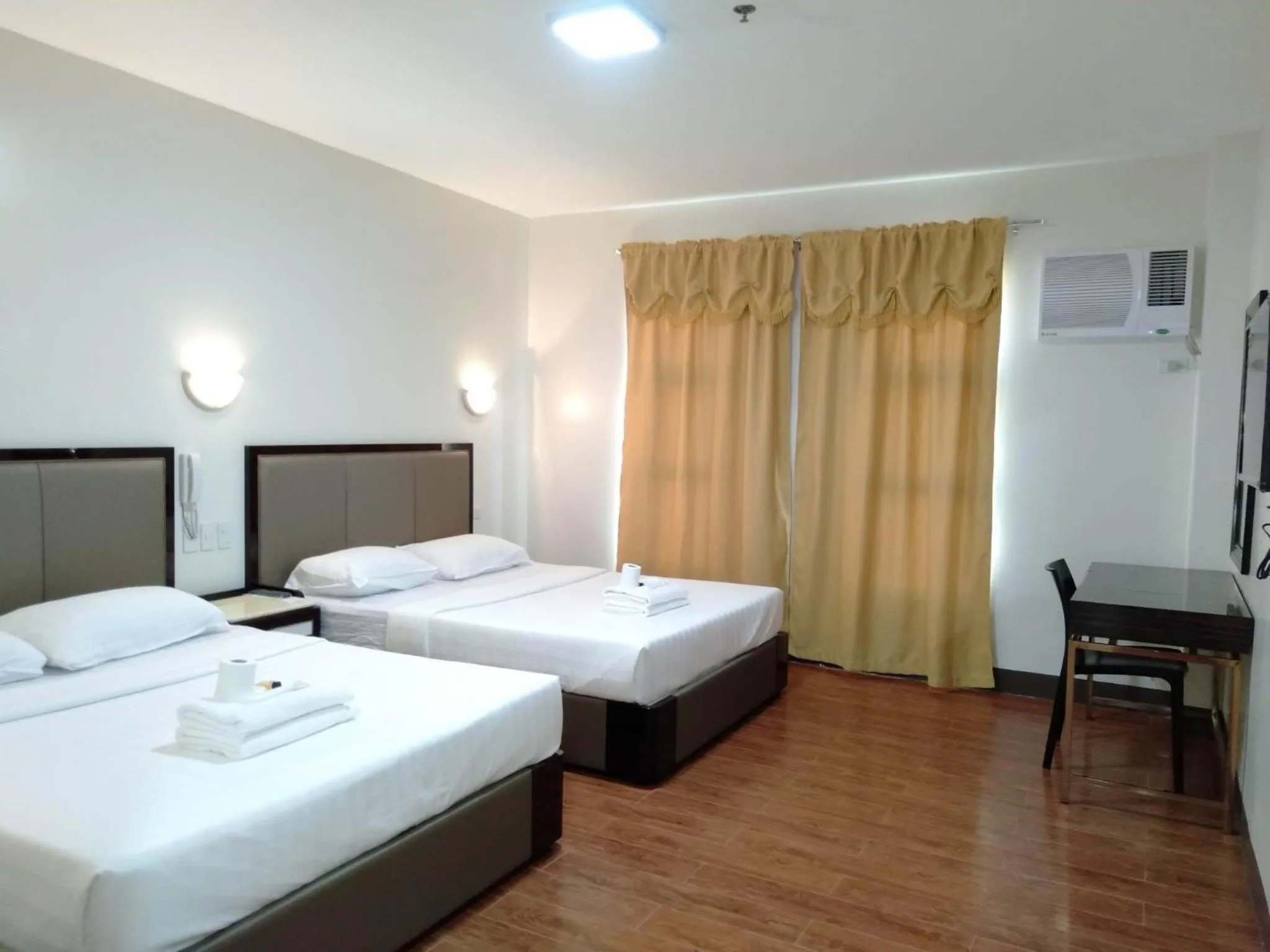 TV and multimedia, Bed in Meaco Royal Hotel- Aparri