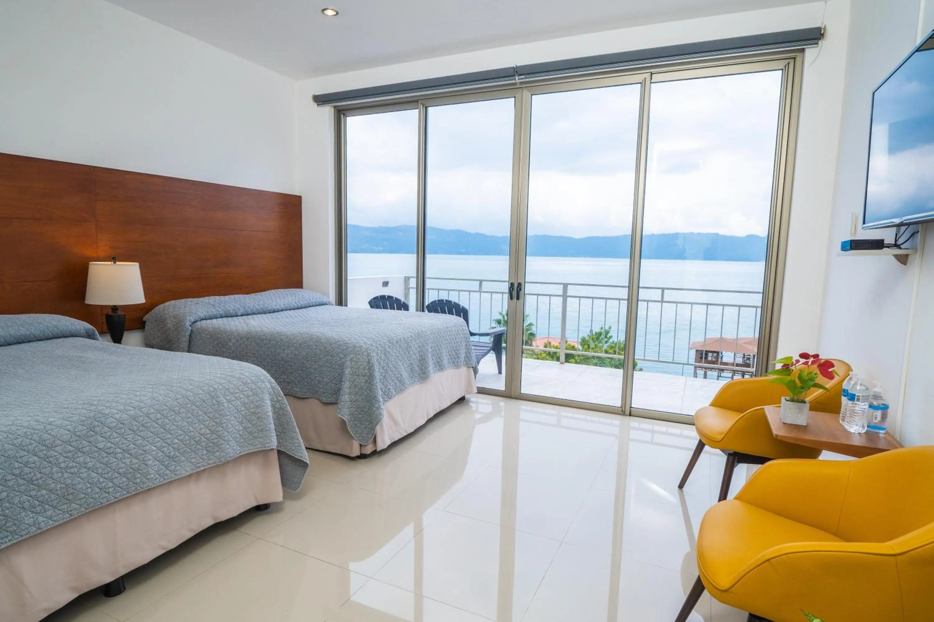 Bed in Equinoccio Hotel