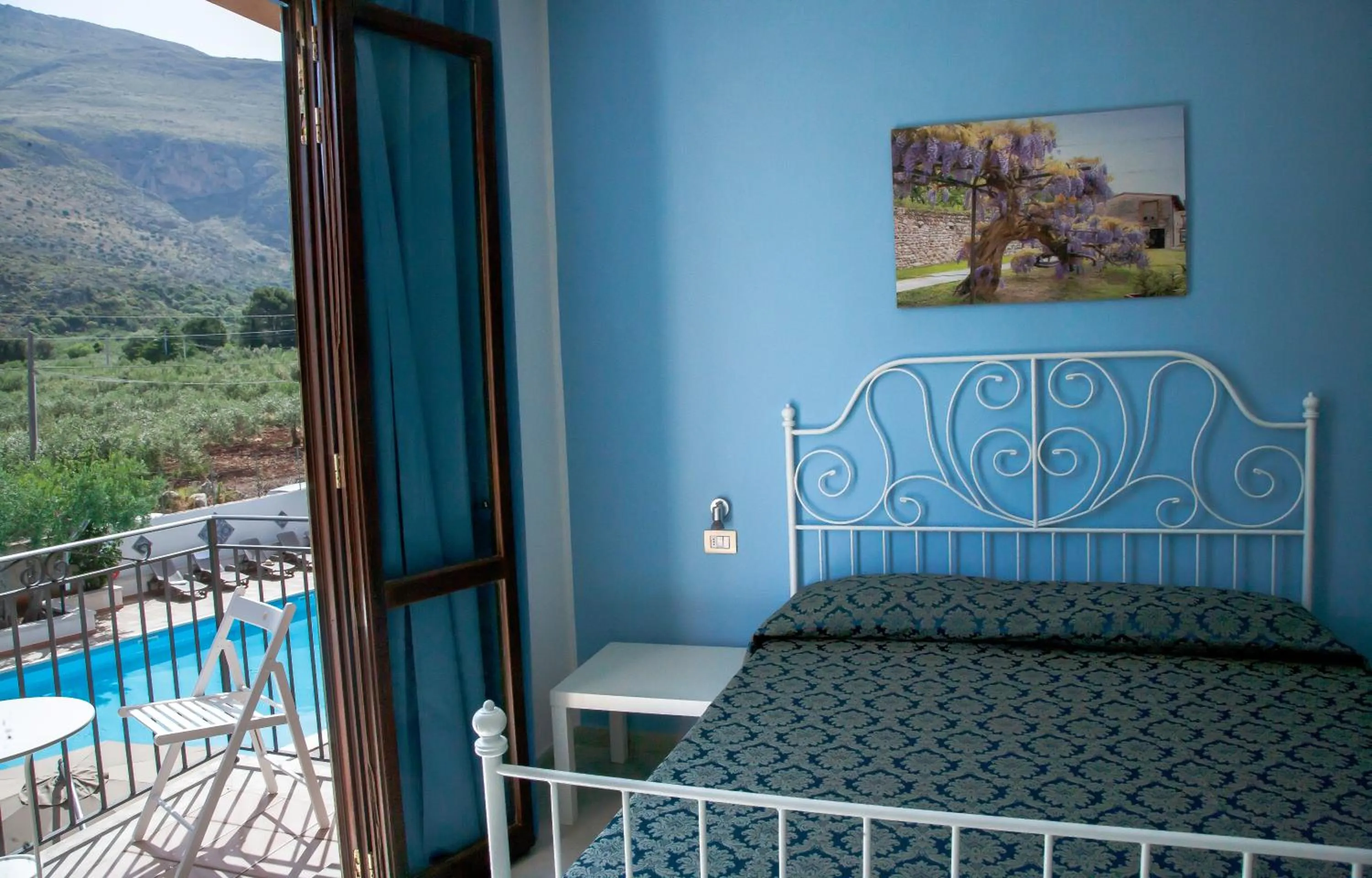 Bedroom in Hotel Achibea