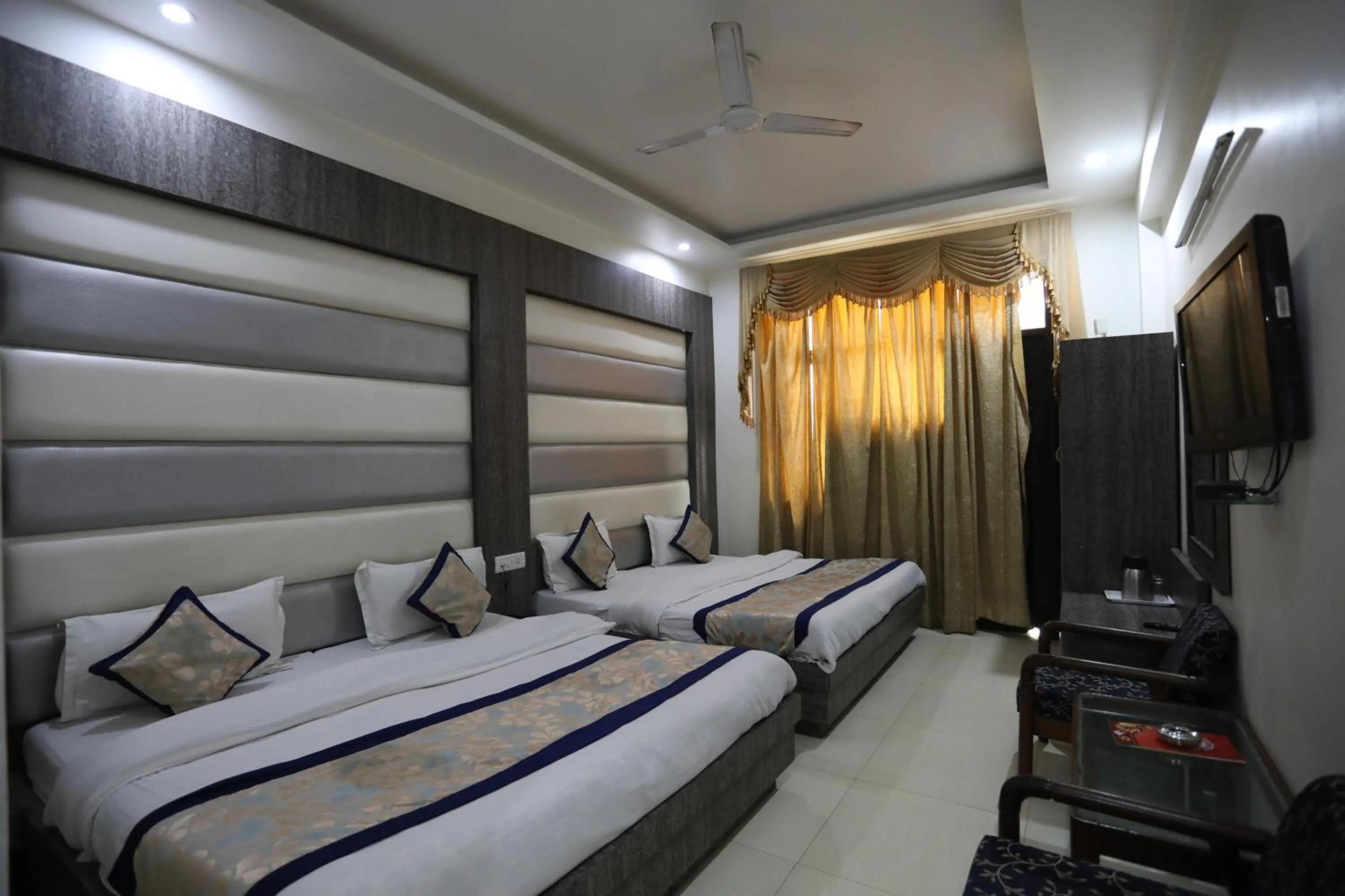 Photo of the whole room, Bed in HOTEL Grand JAGDISH RESIDENCY