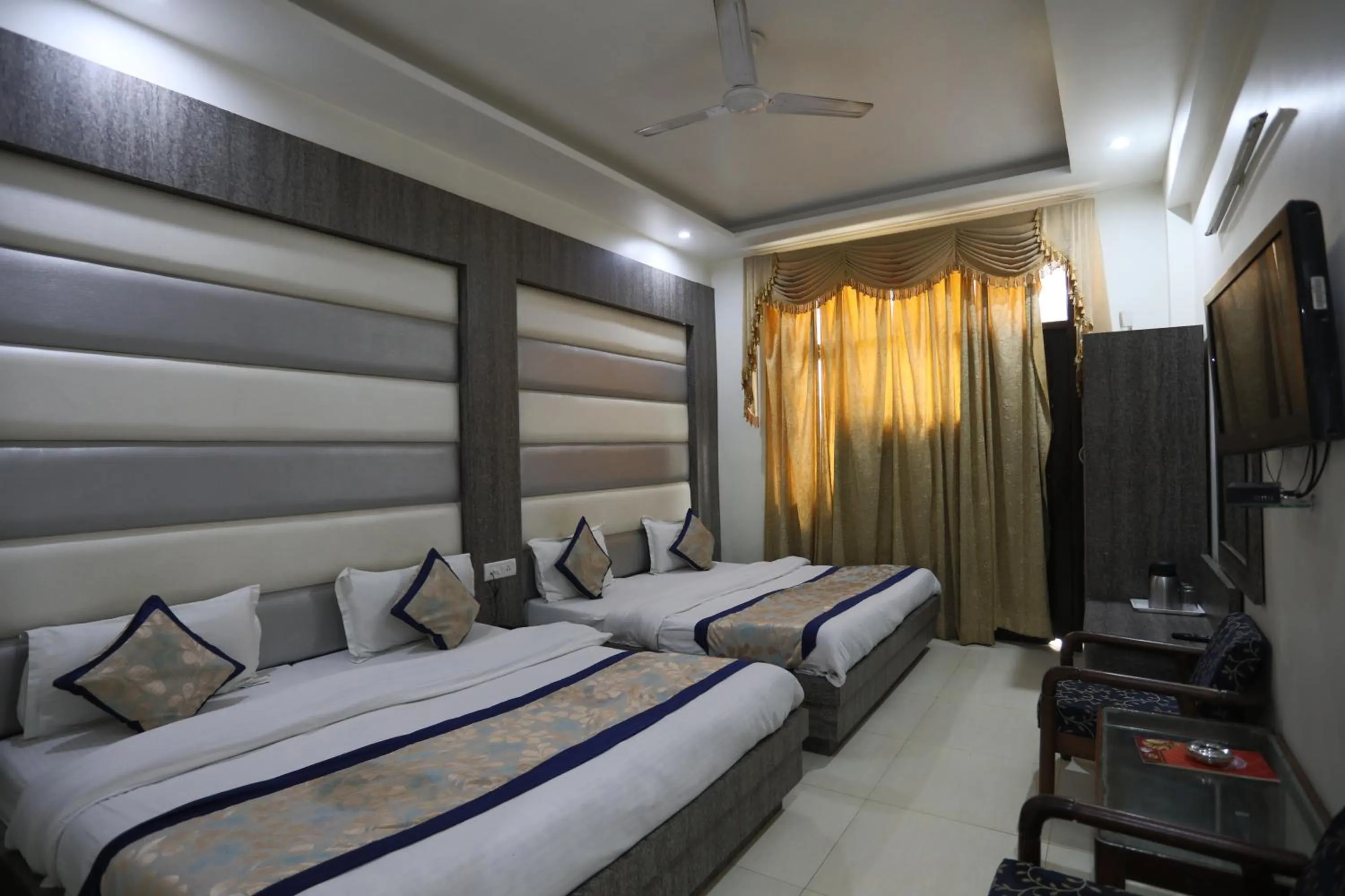 Photo of the whole room, Bed in HOTEL Grand JAGDISH RESIDENCY