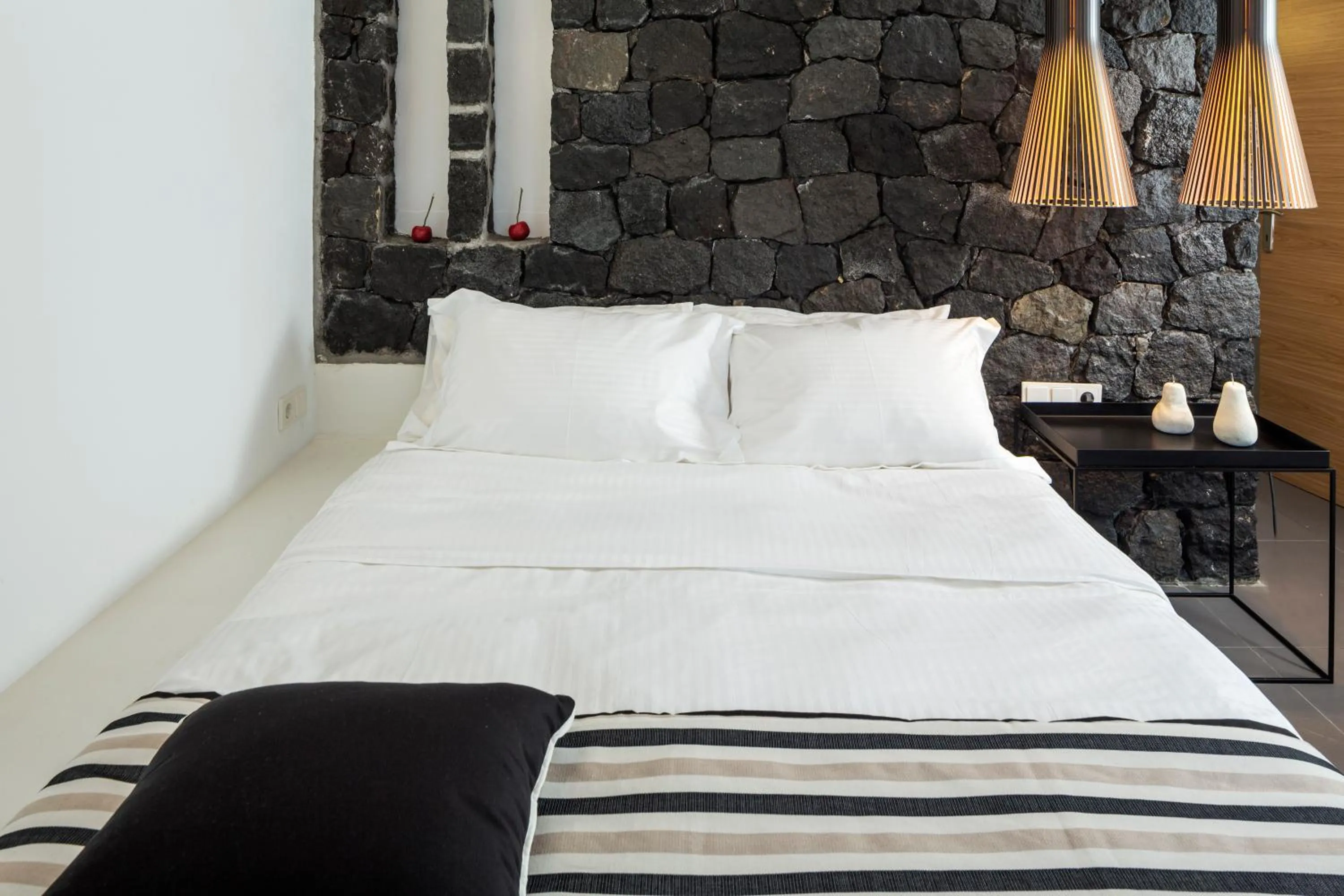 Bed in Aroma Suites