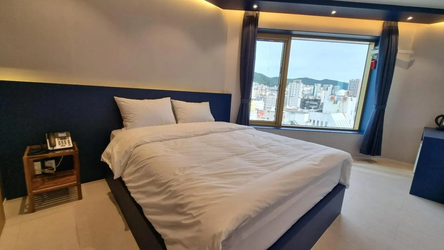 Bedroom in Gold Stone Hotel