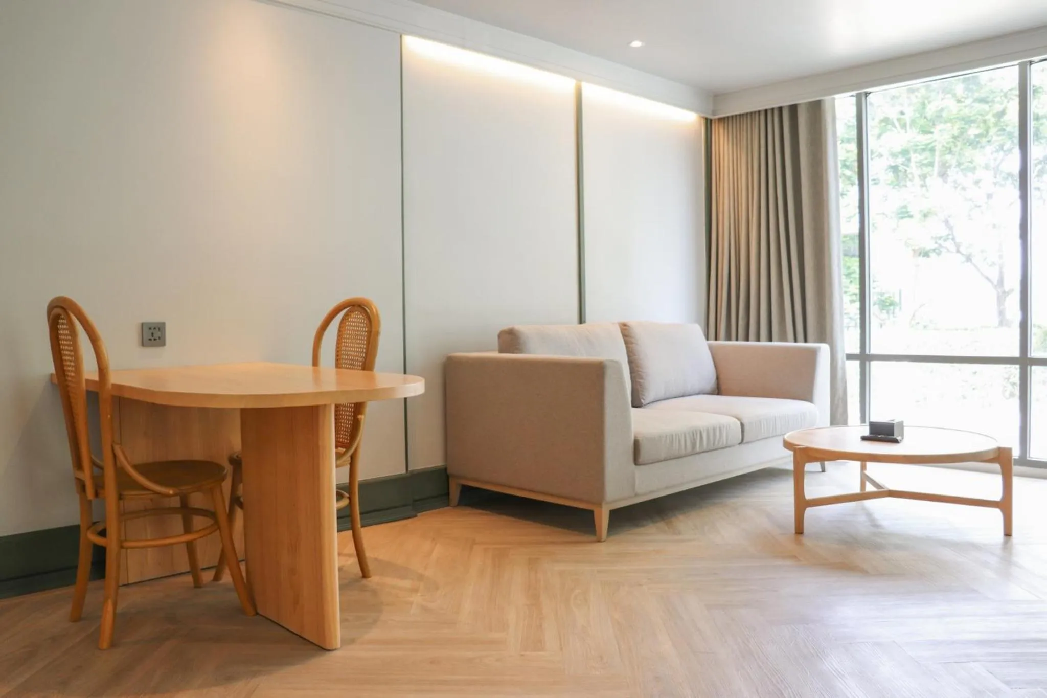 Living room in The Quarter Chaophraya by UHG