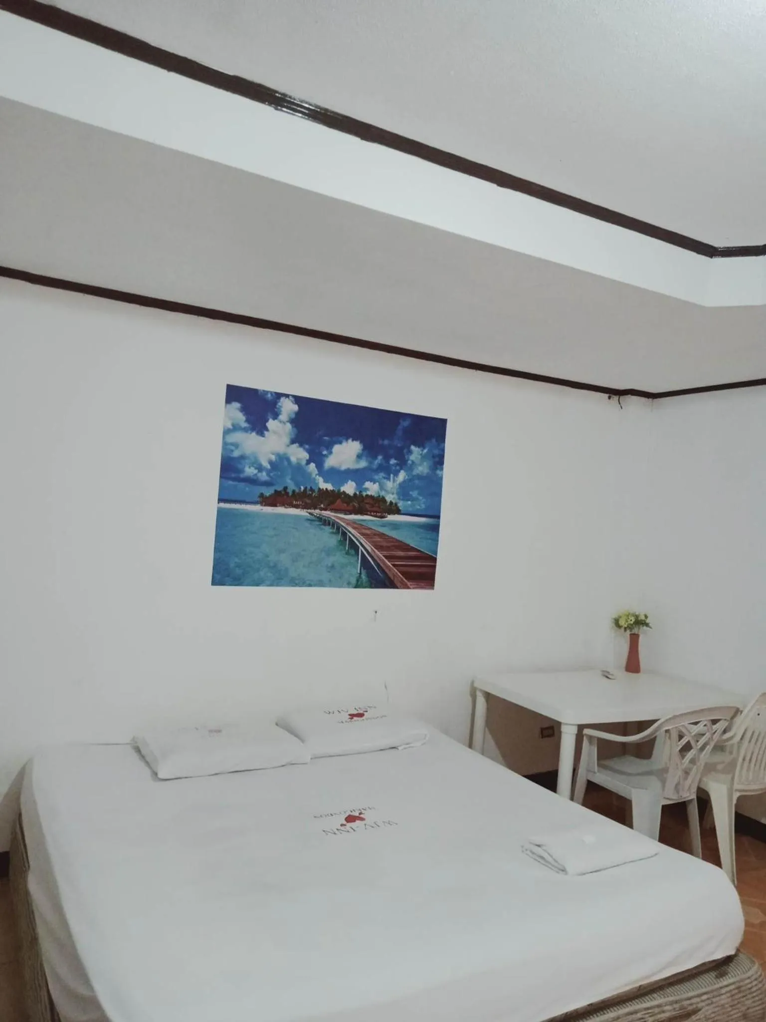 Bed in WJV INN Marigondon