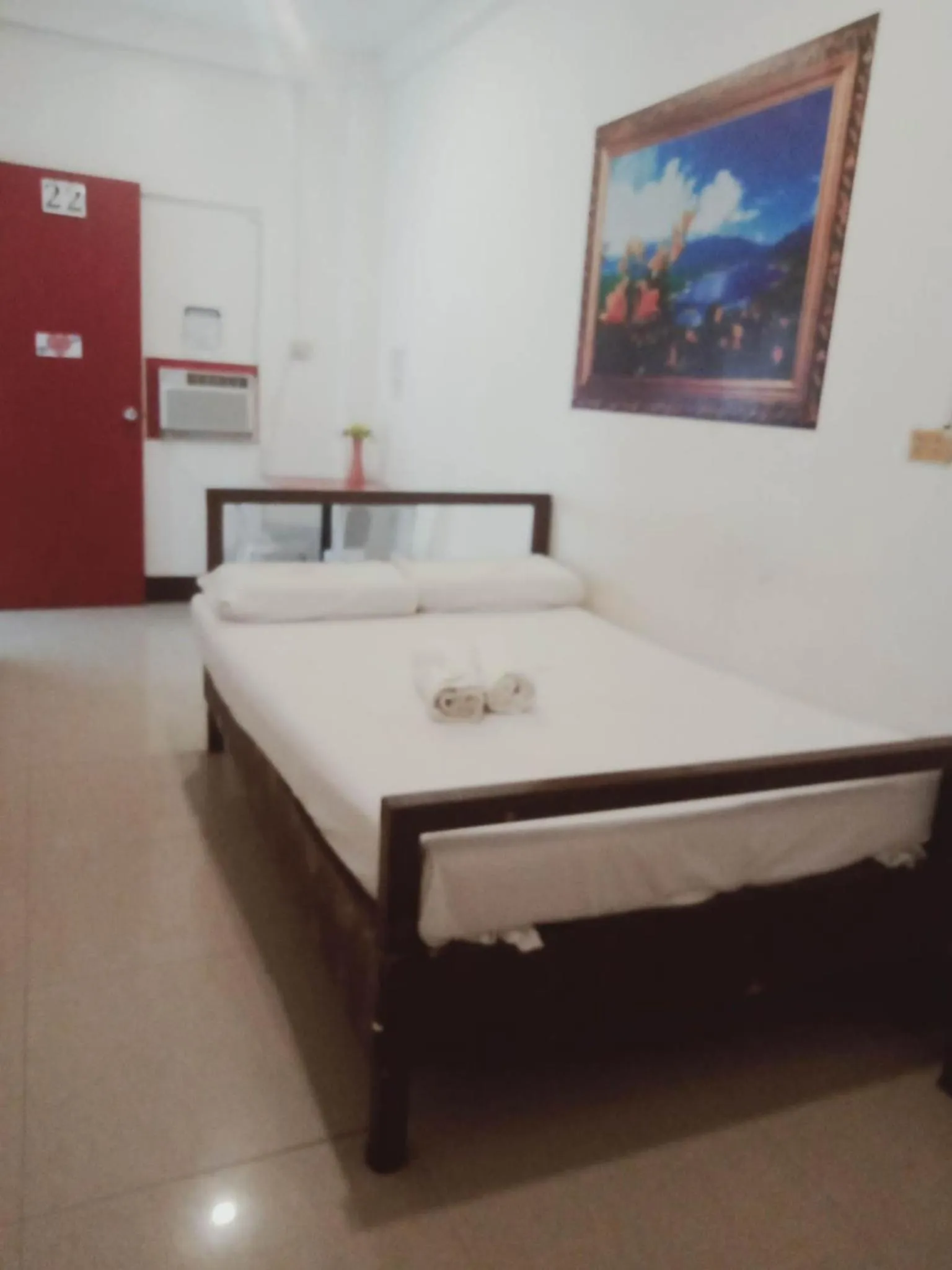 Bed in WJV INN Marigondon