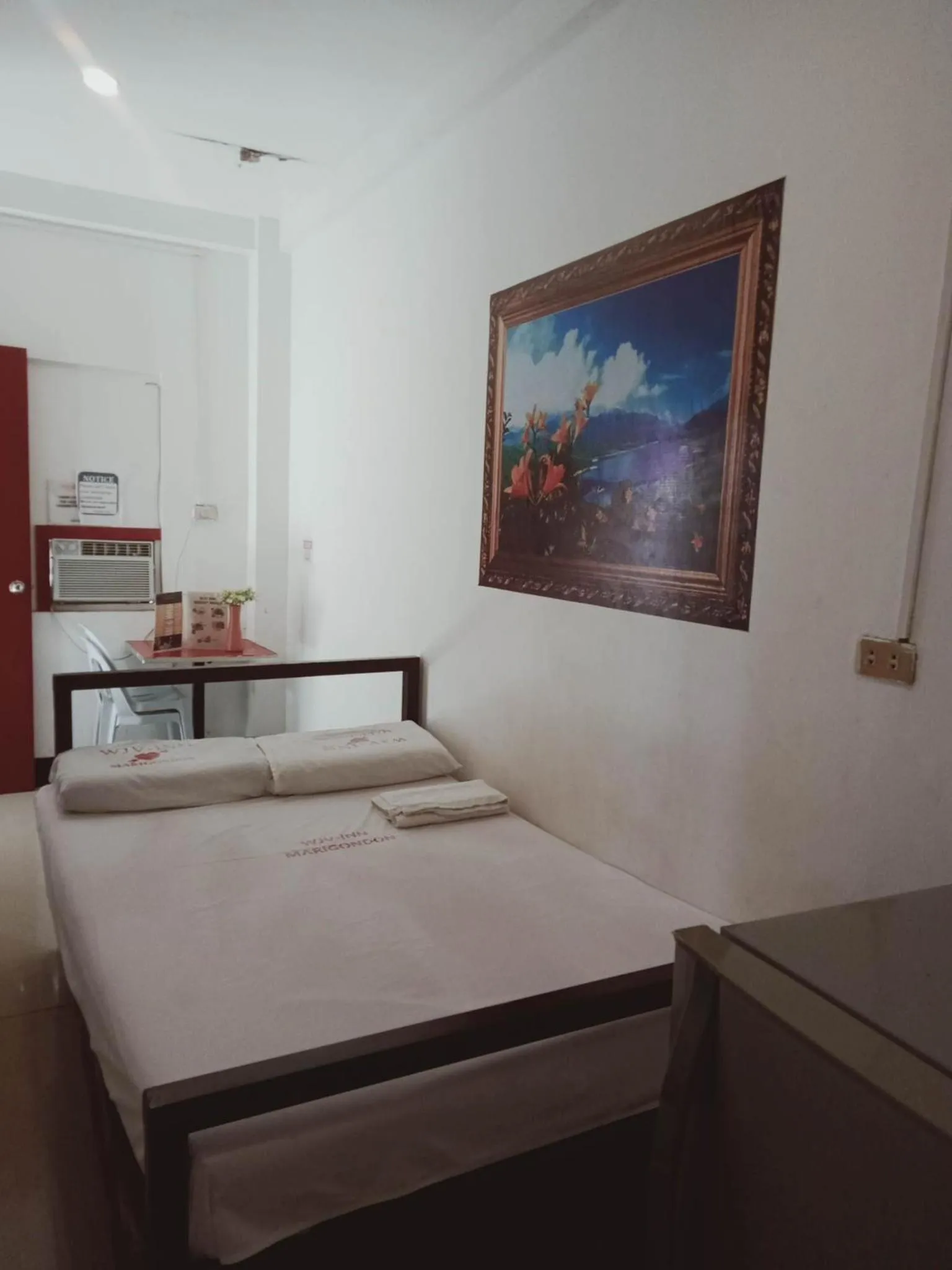 Bed in WJV INN Marigondon