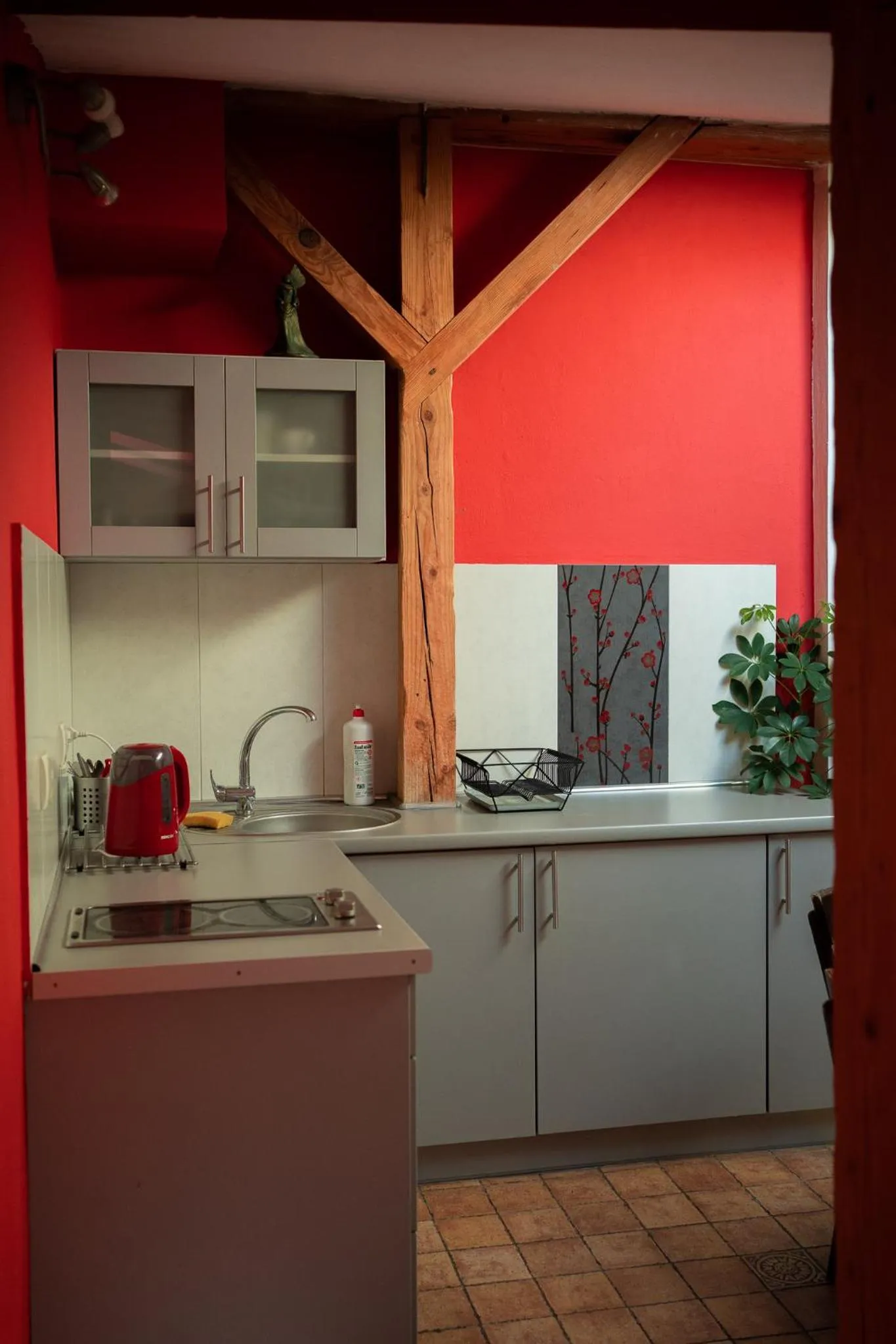 Kitchen or kitchenette in Kolory Guest House