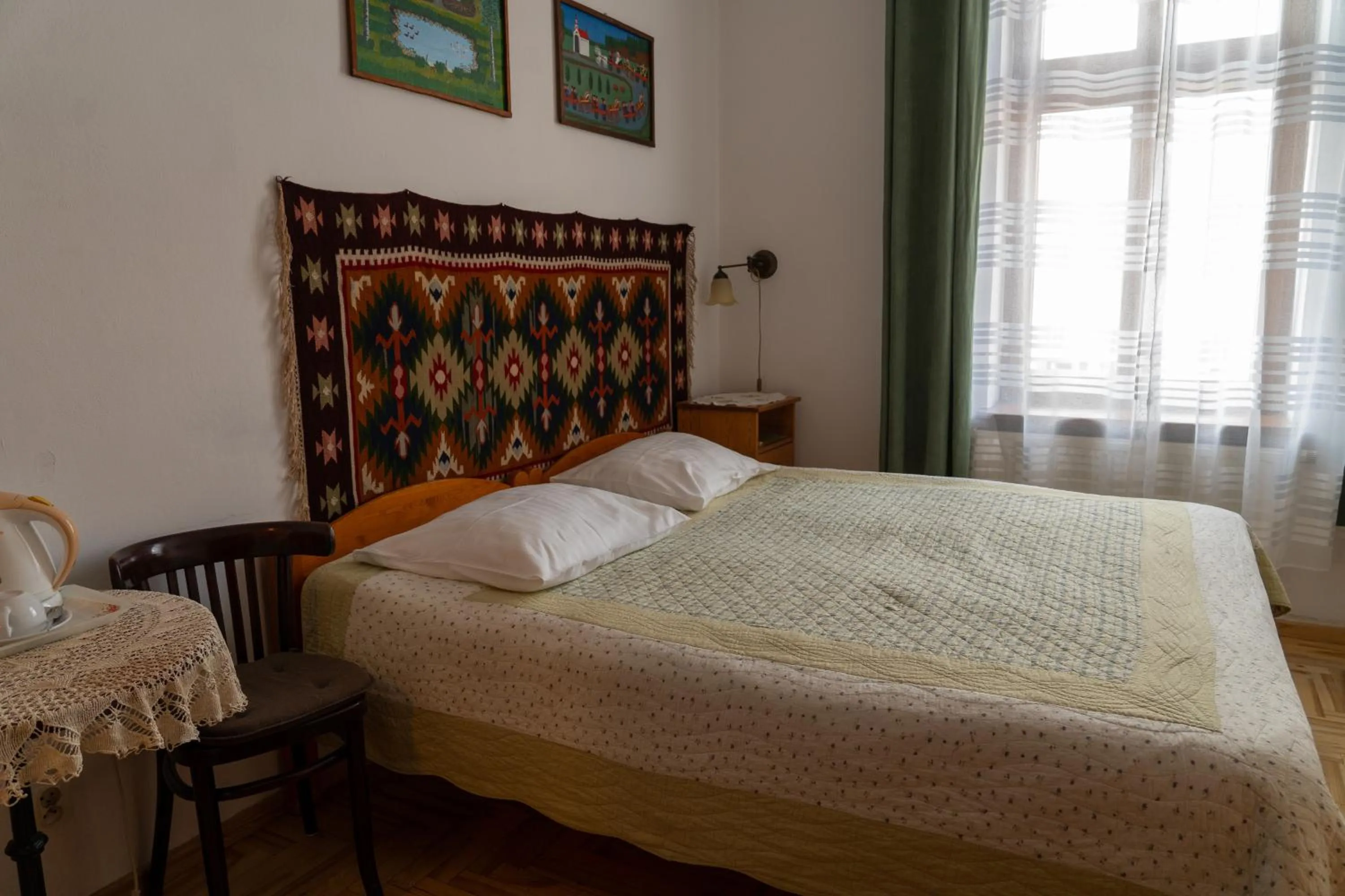Bed in Kolory Guest House