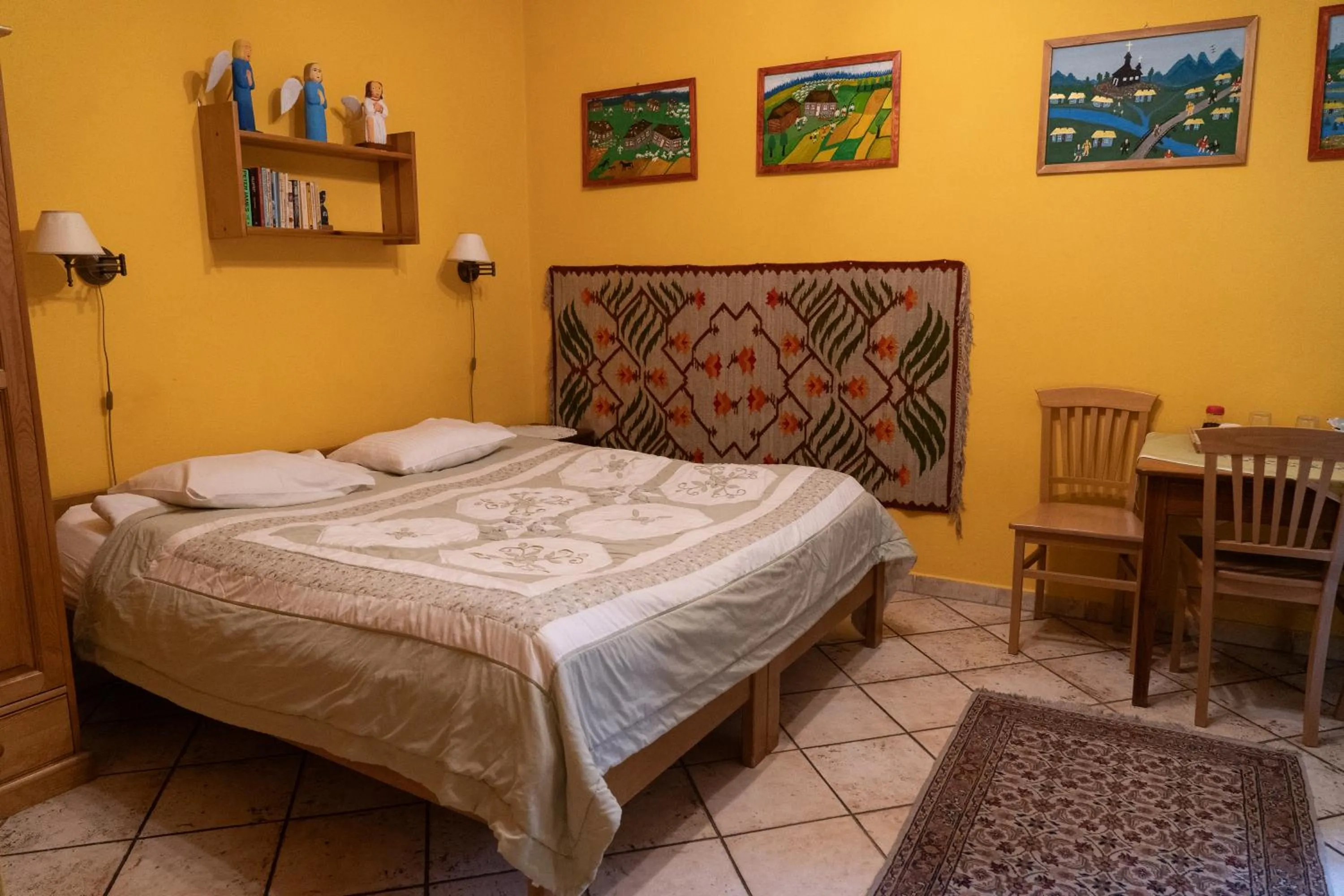 Bed in Kolory Guest House