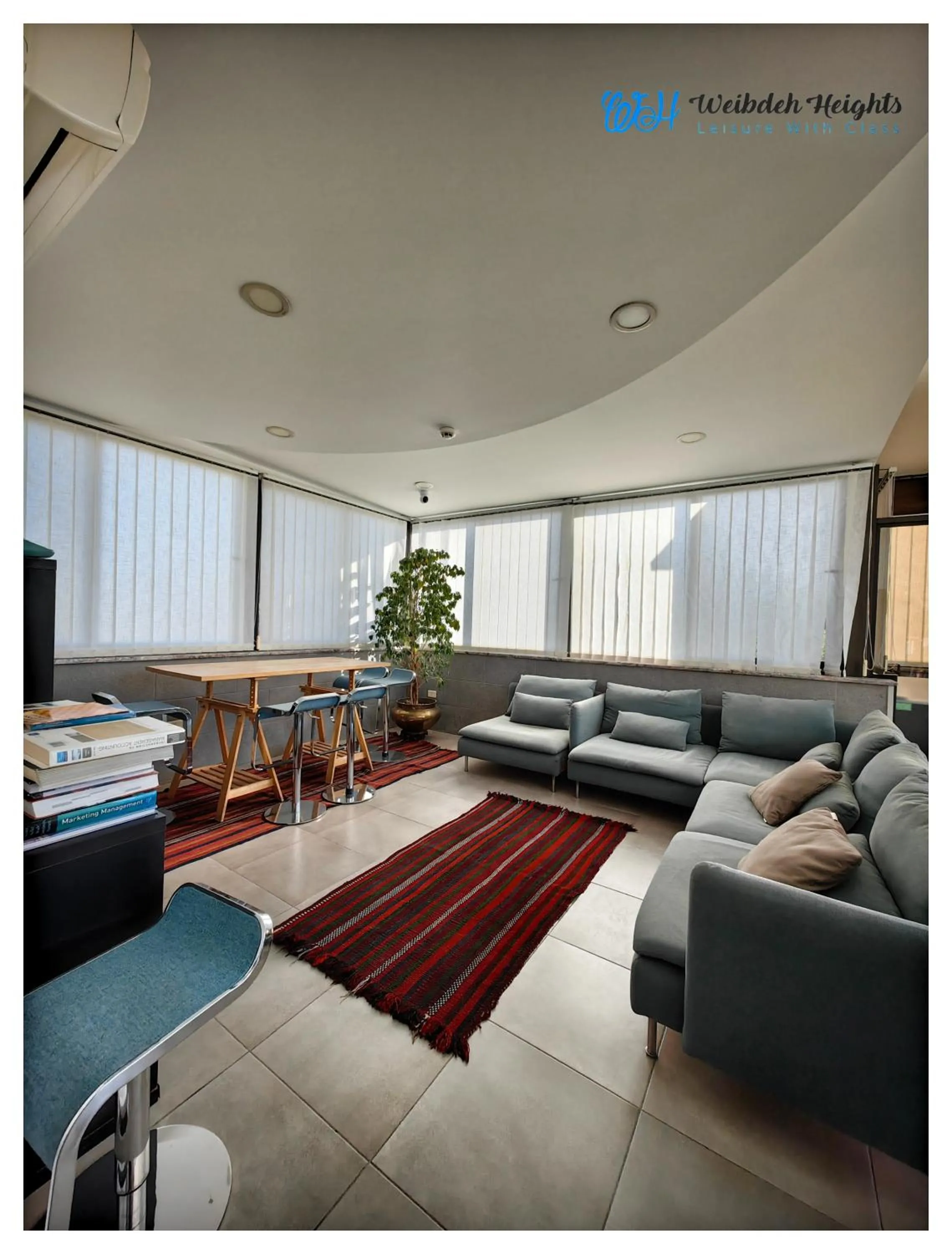 Seating area in Weibdeh Heights Hotel Suites