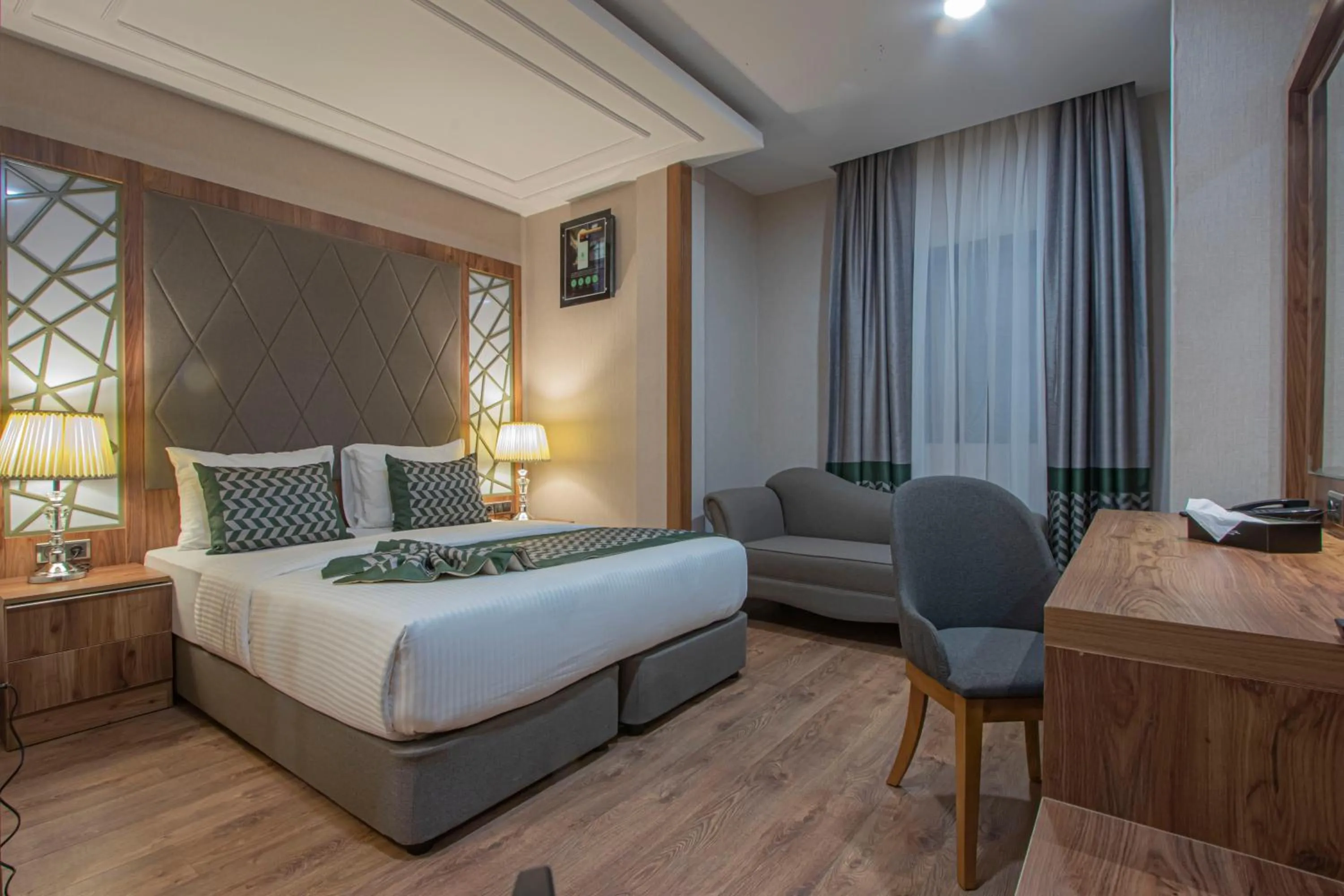 Bed in UNITED HOTEL INTERNATIONAL