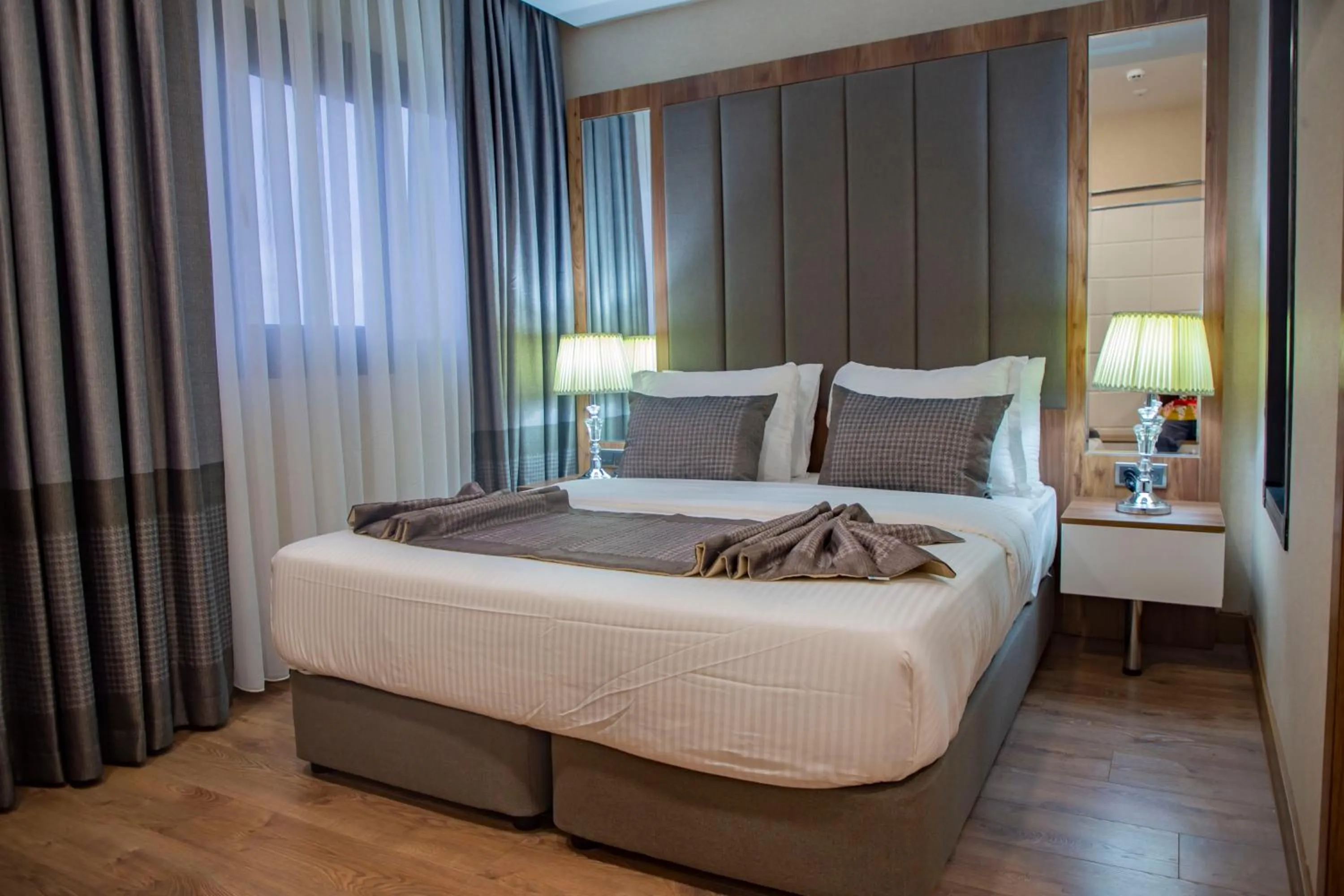 Bed in UNITED HOTEL INTERNATIONAL