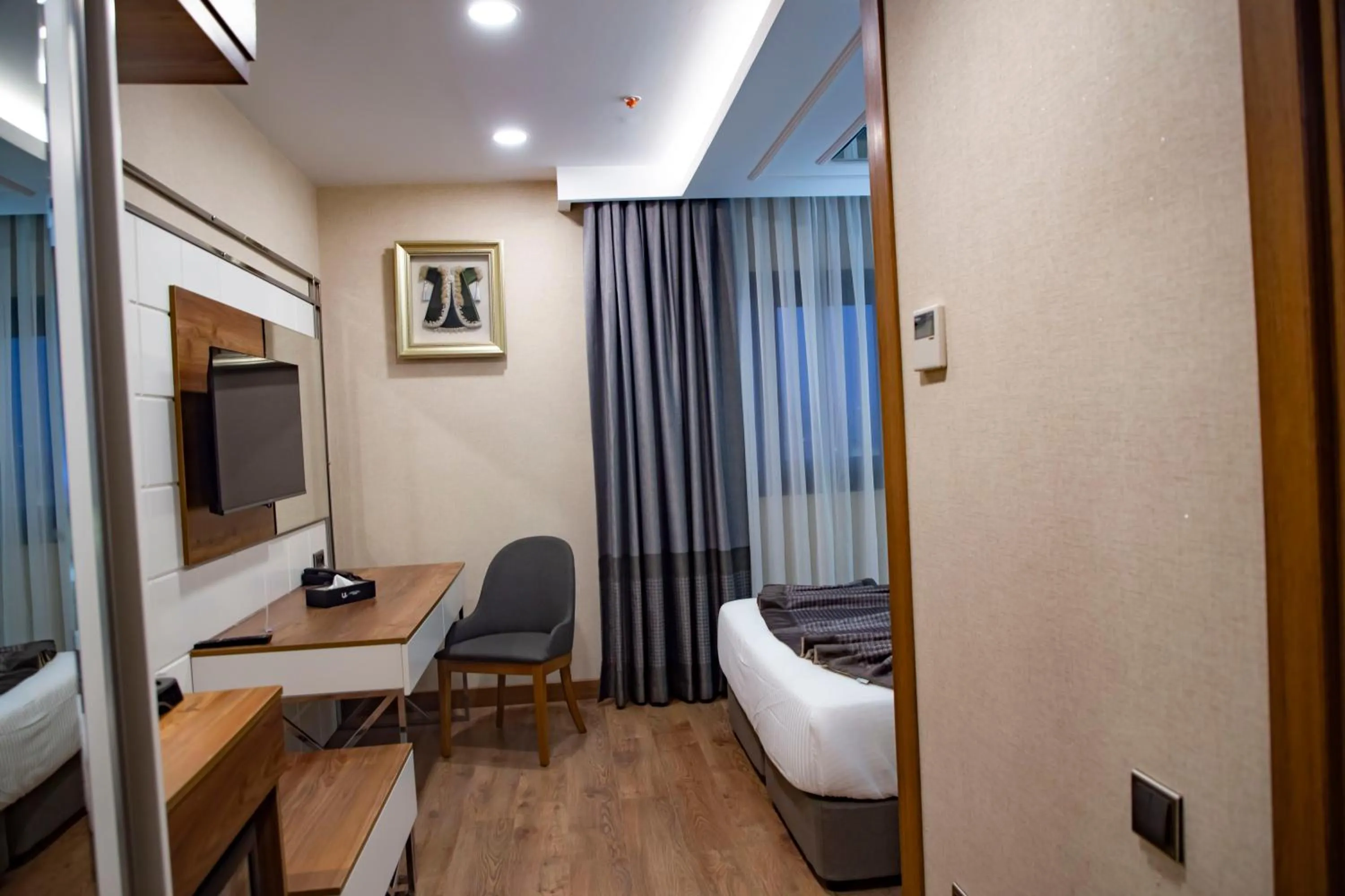 Photo of the whole room, Bed in UNITED HOTEL INTERNATIONAL