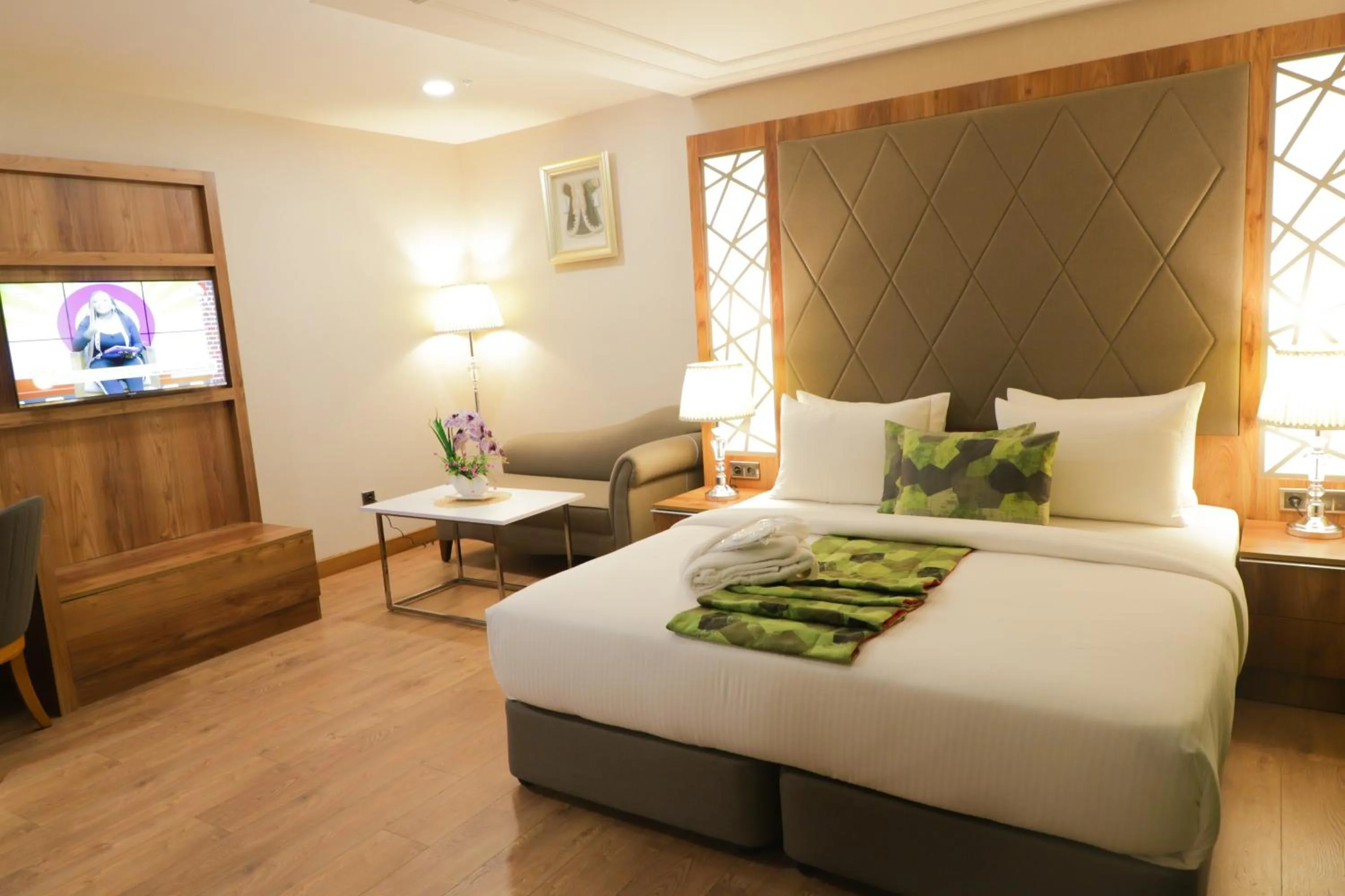 Bed in UNITED HOTEL INTERNATIONAL