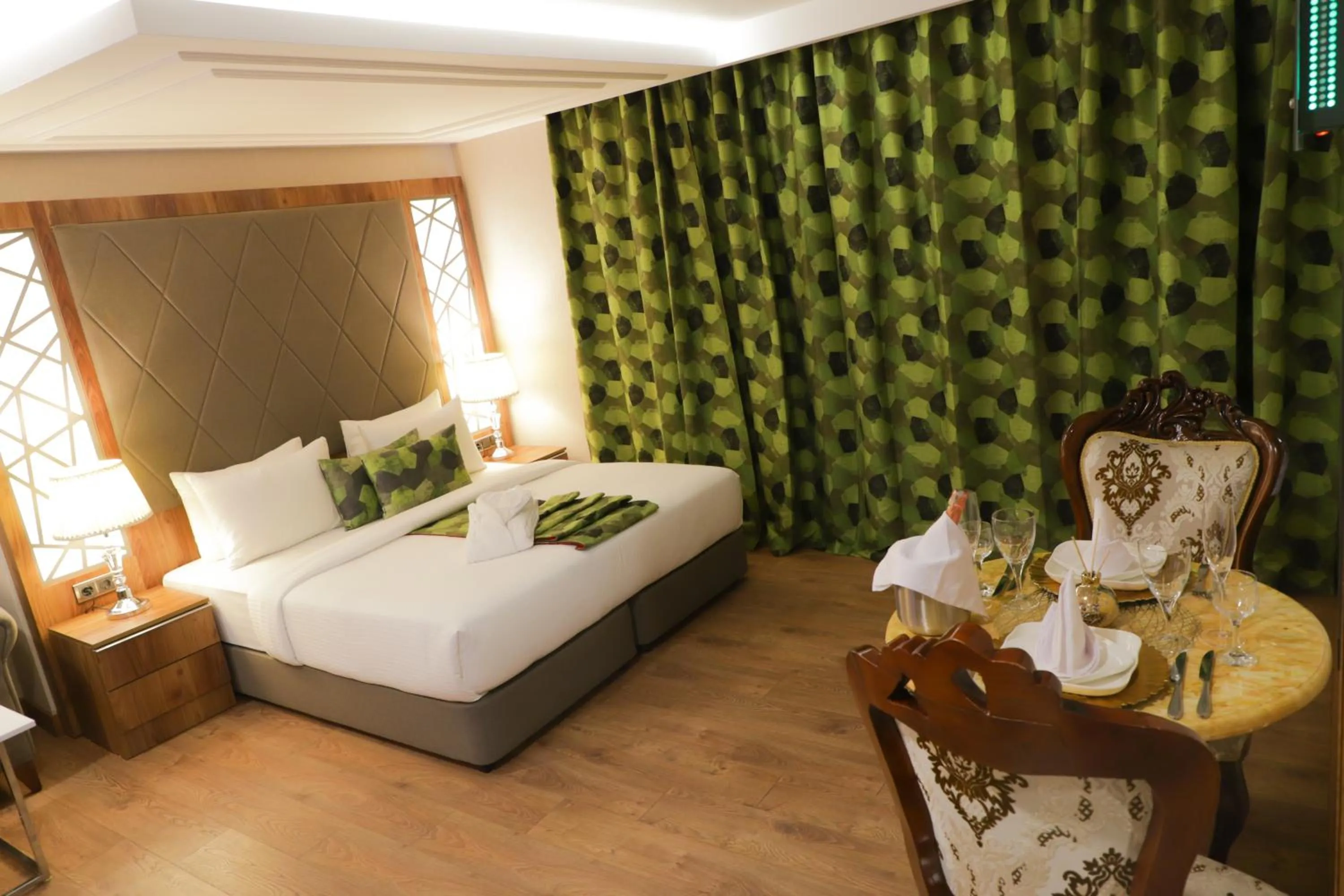 Bed in UNITED HOTEL INTERNATIONAL