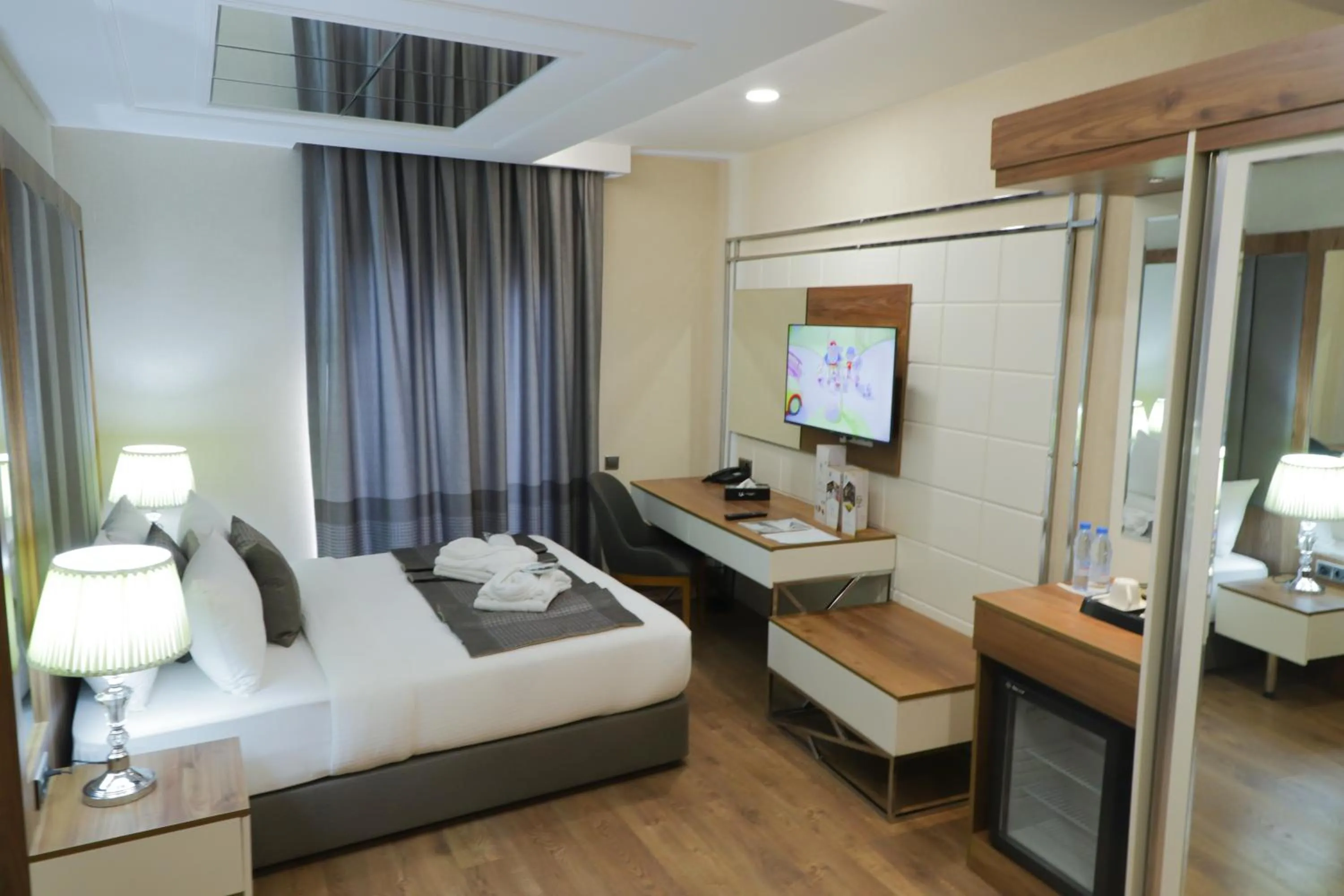 Bed in UNITED HOTEL INTERNATIONAL