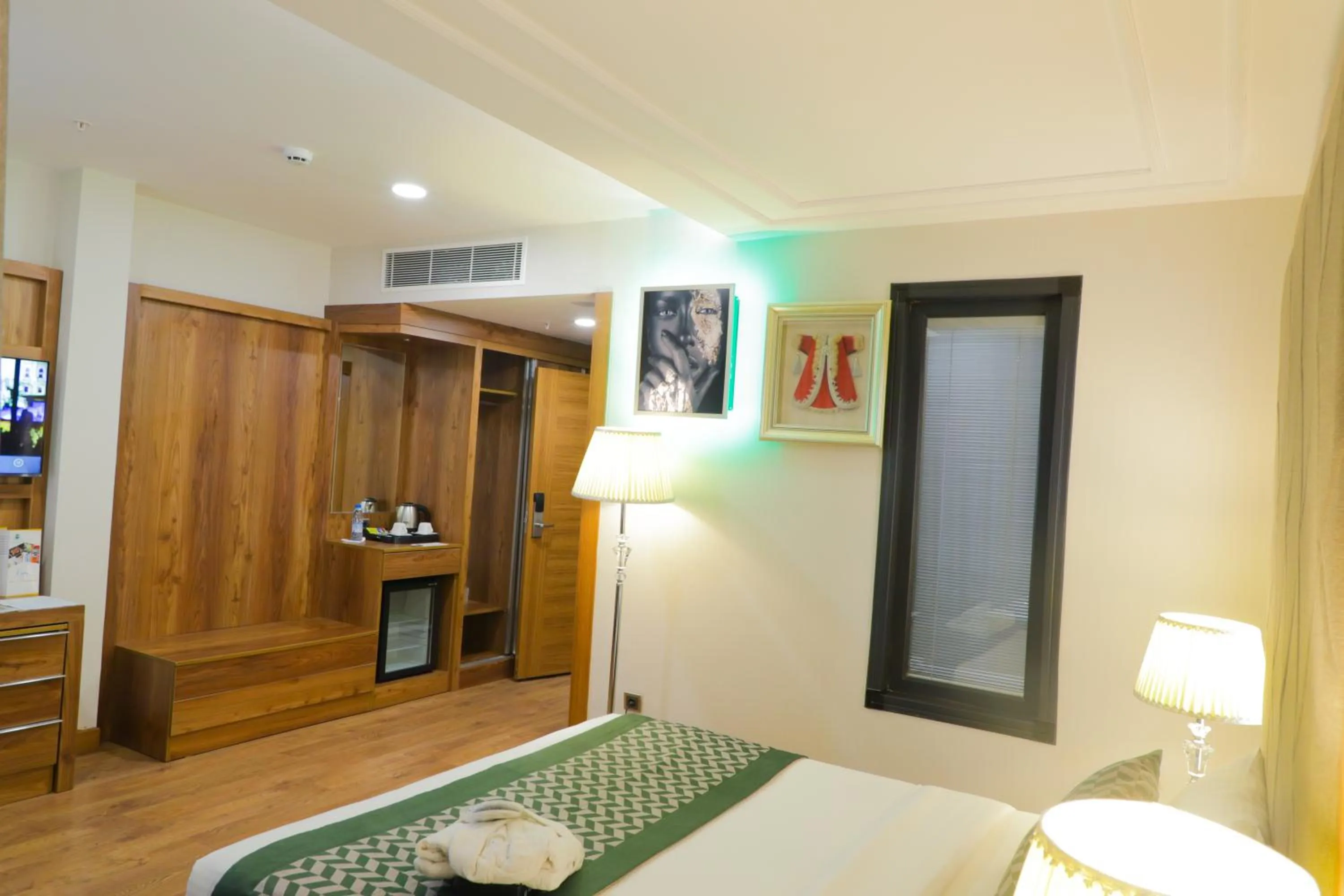 Bed in UNITED HOTEL INTERNATIONAL