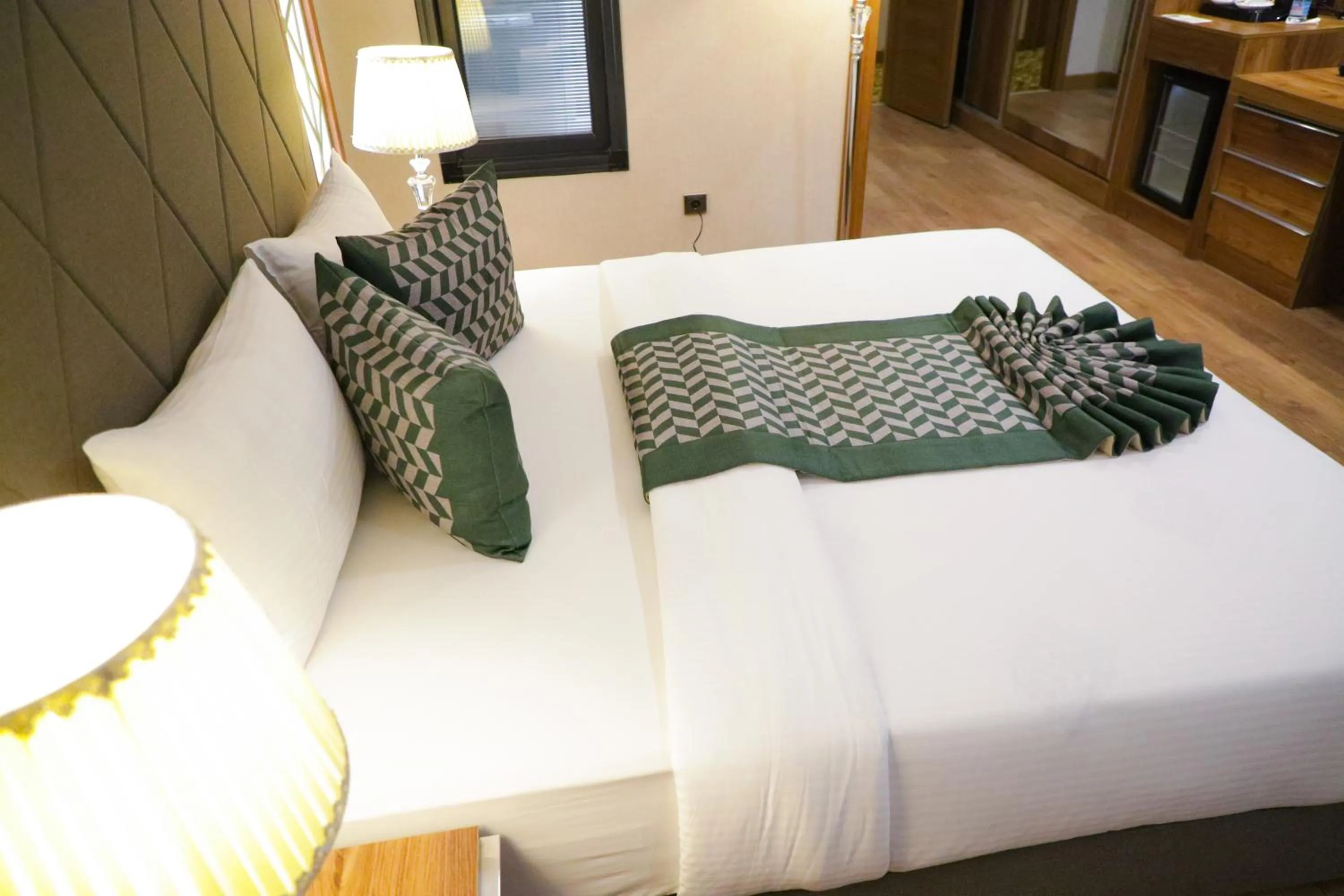 Bed in UNITED HOTEL INTERNATIONAL