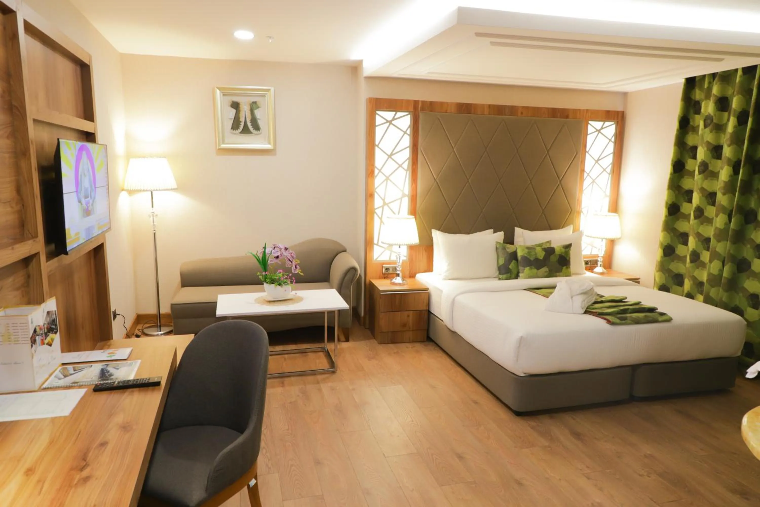 Bed in UNITED HOTEL INTERNATIONAL