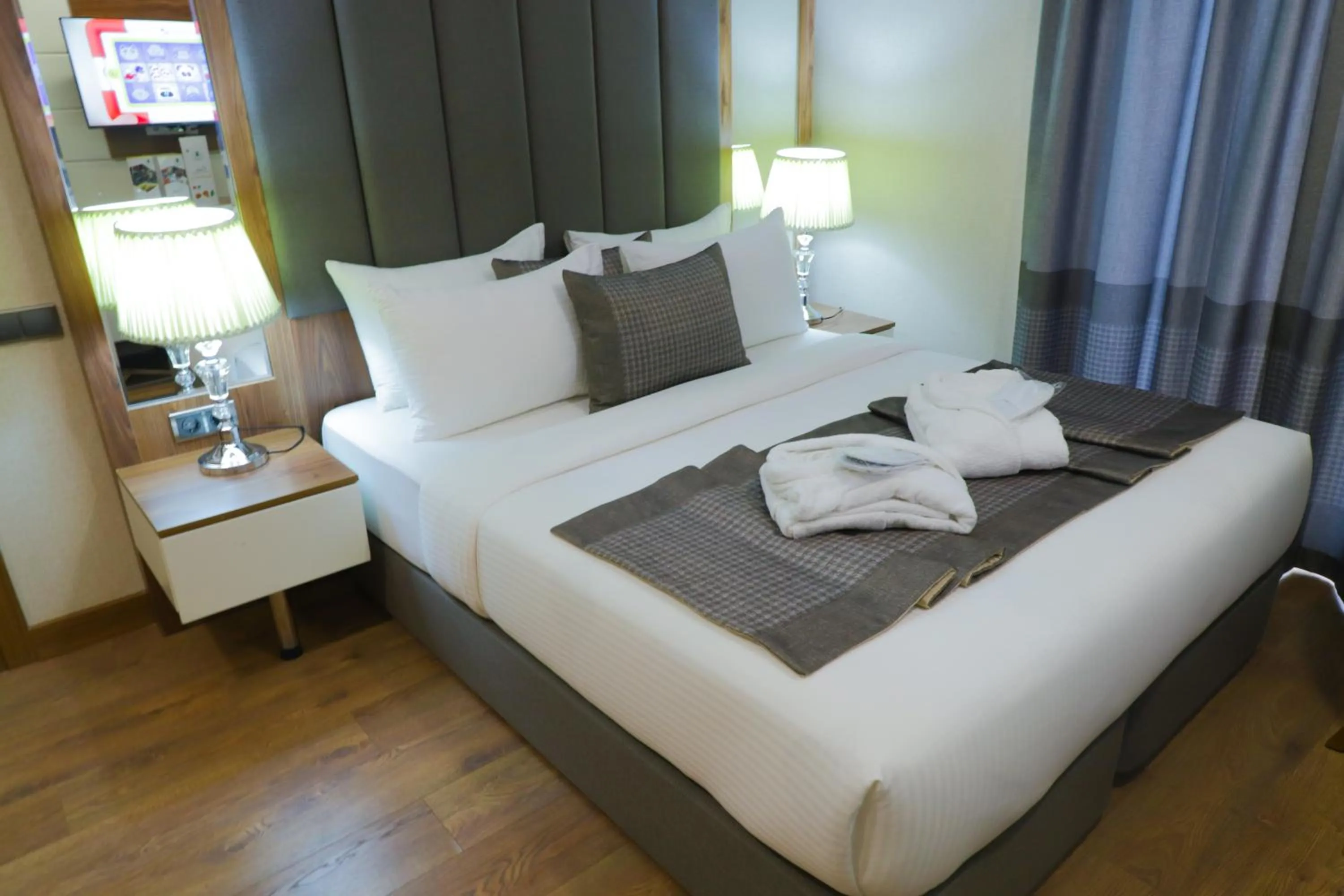 Bed in UNITED HOTEL INTERNATIONAL