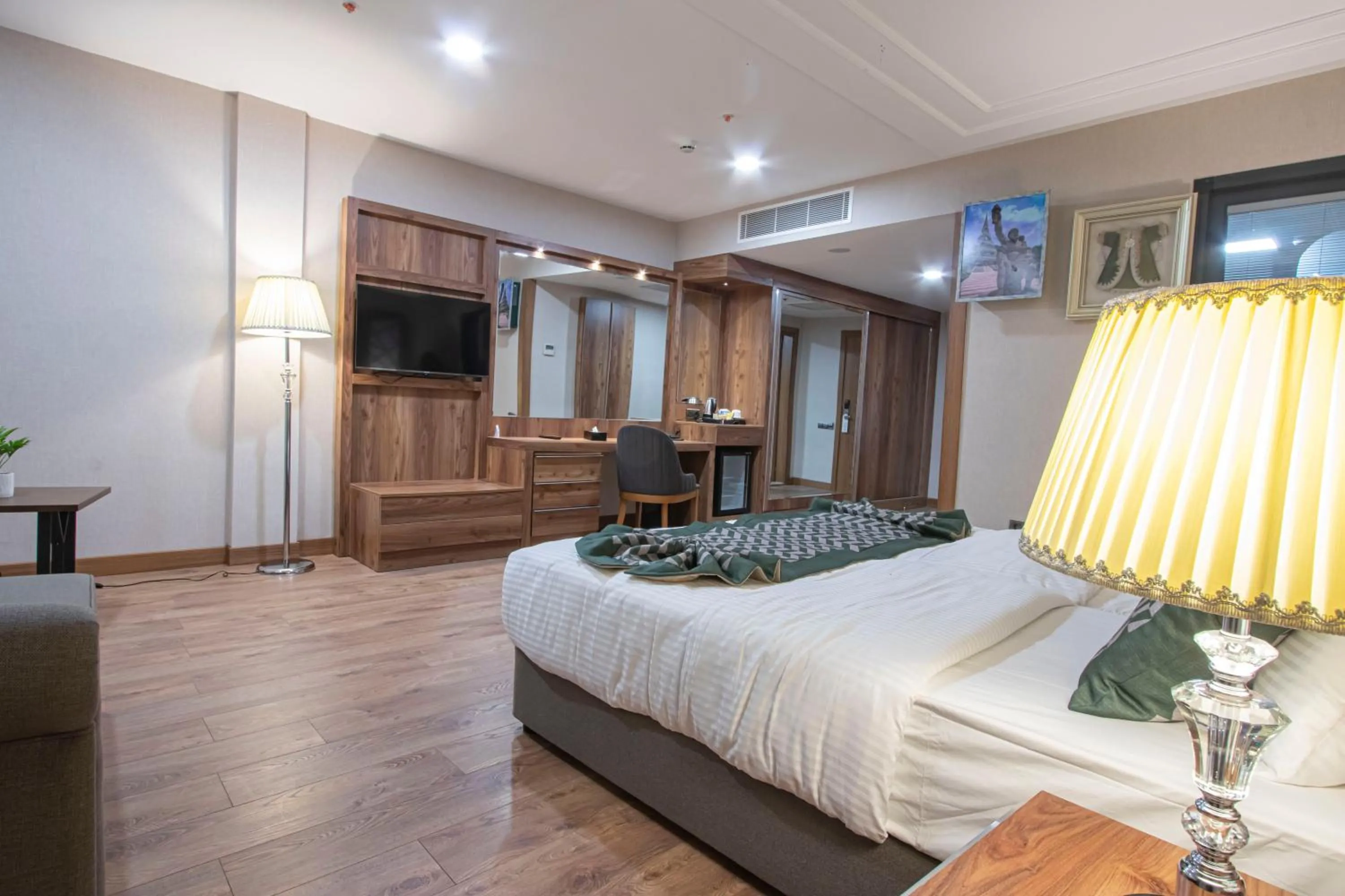 Bed in UNITED HOTEL INTERNATIONAL