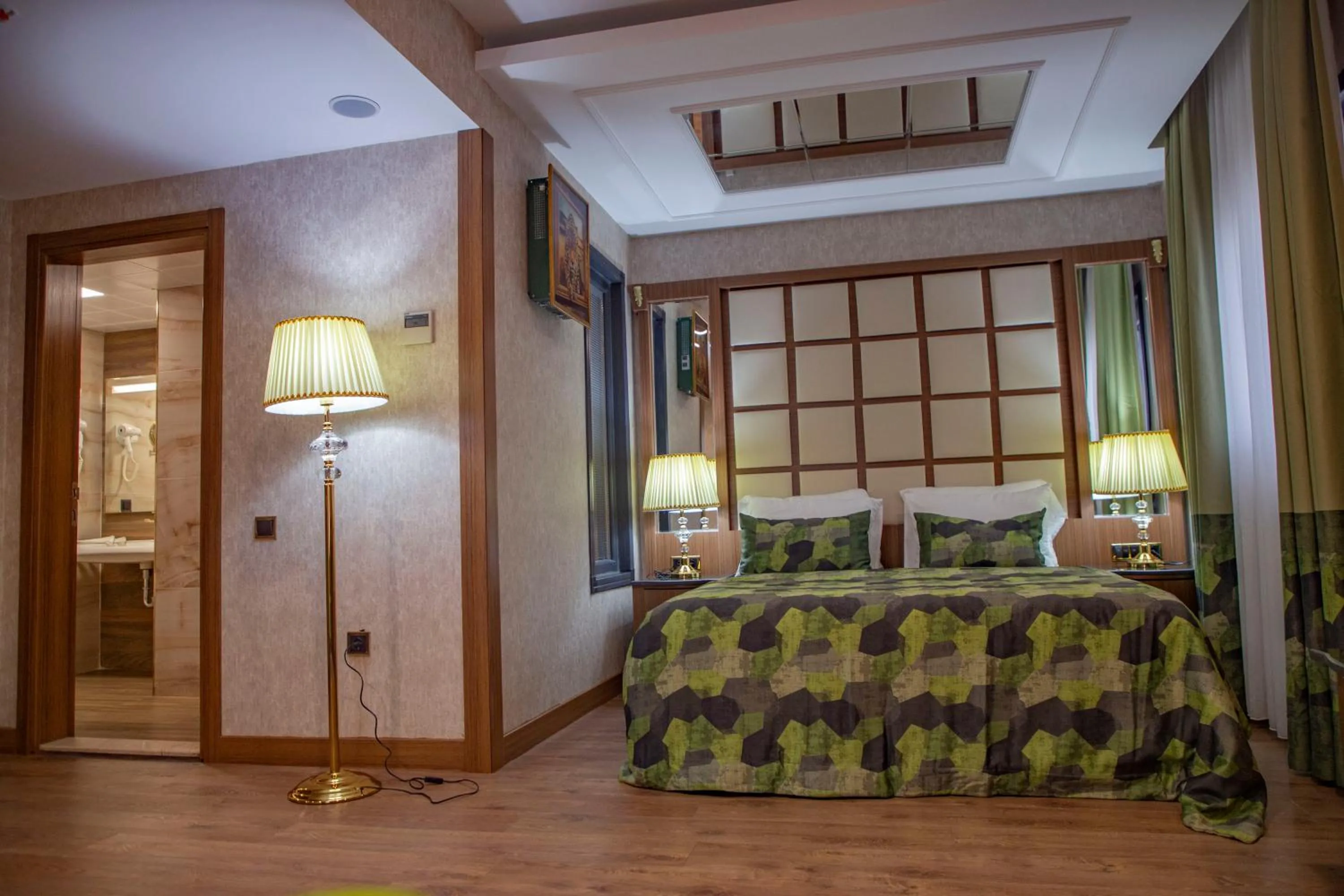 Bed in UNITED HOTEL INTERNATIONAL