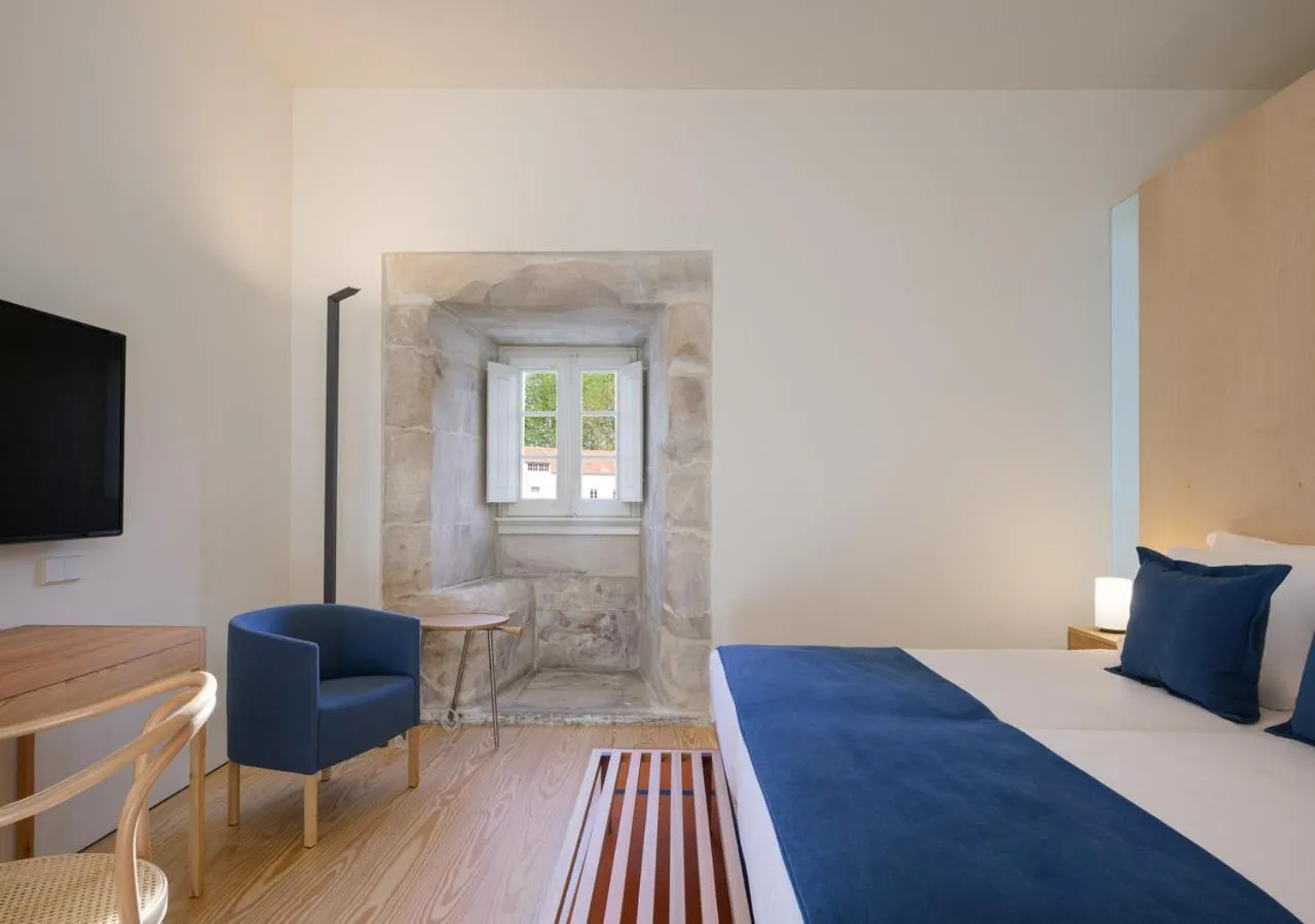 Bed in Montebelo Mosteiro de Alcobaça Historic Hotel