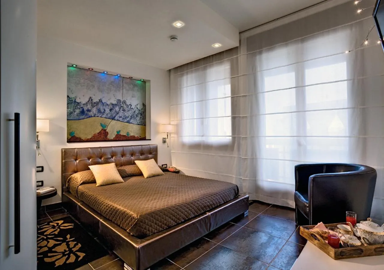 Balcony/Terrace, Bed in Hotel Le Tegnue