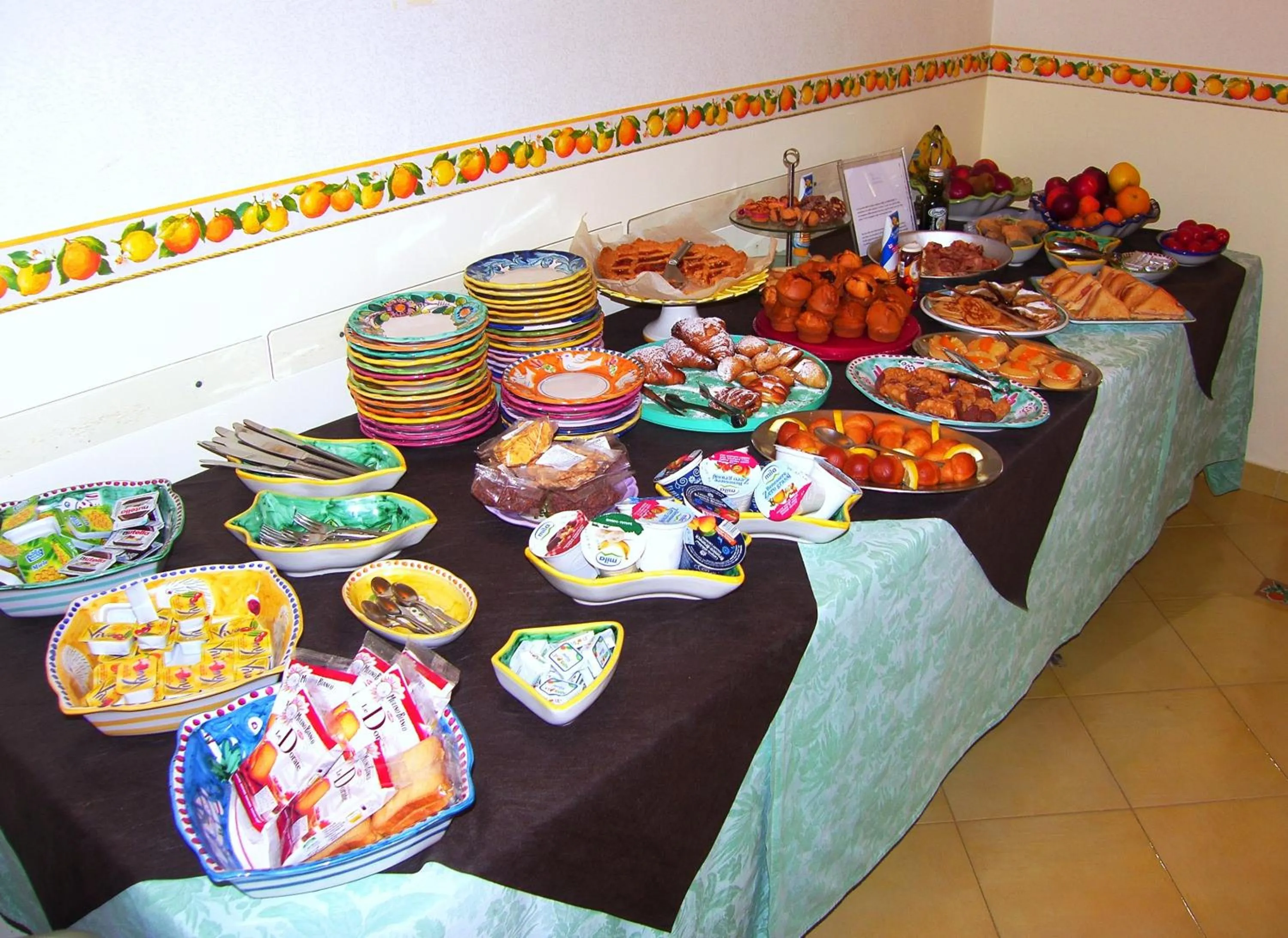 Communal lounge/ TV room in Locanda Degli Agrumi