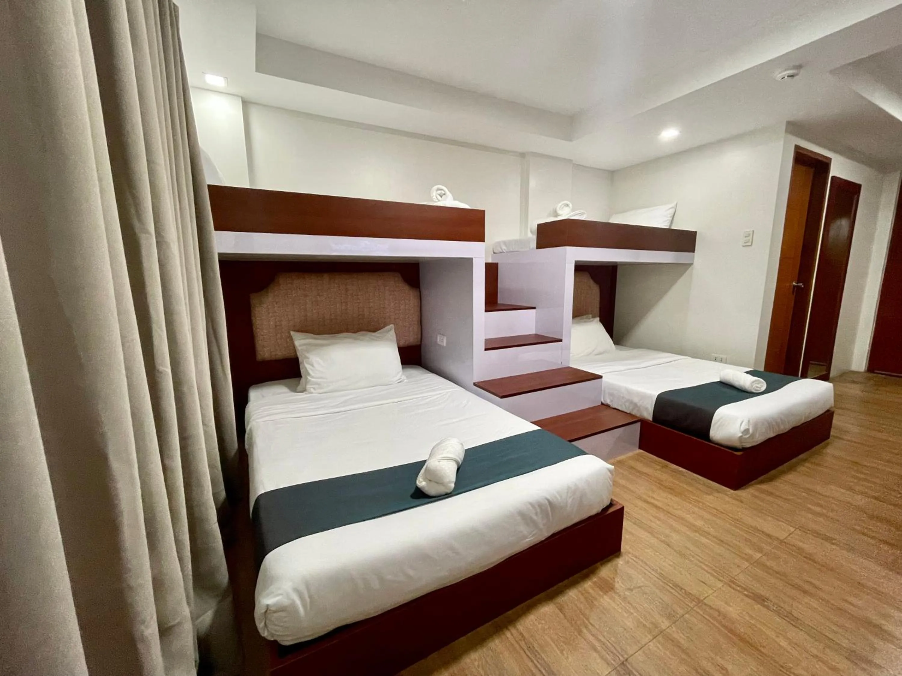 Bed in Staycation Hotel