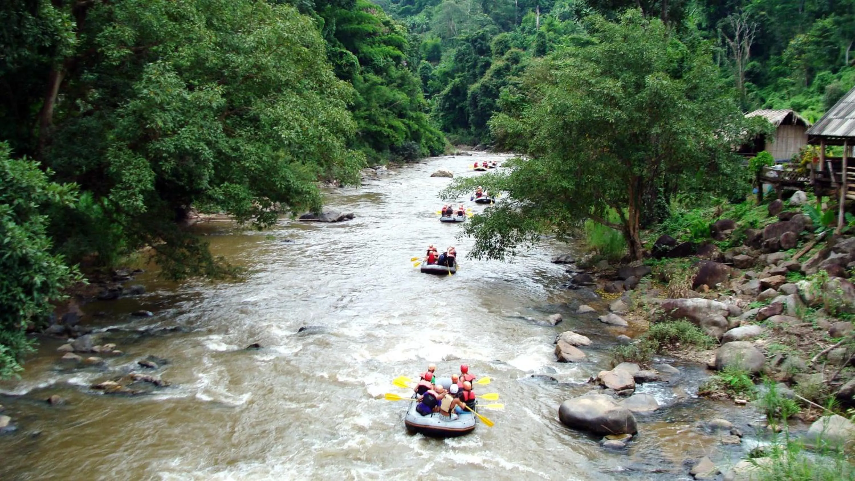 Canoeing in Swiss Chalet Garden, Pool Resort