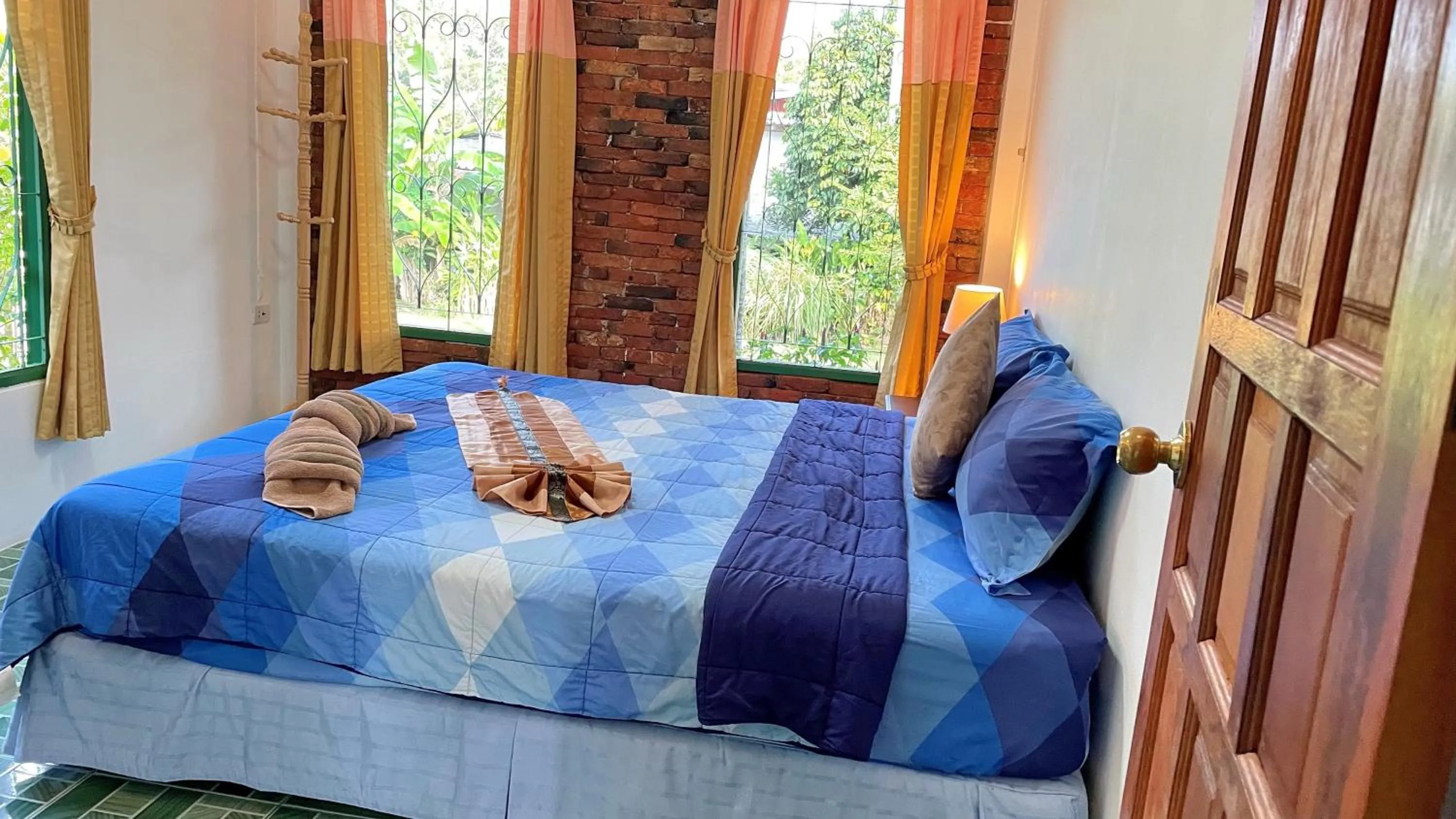 Bed in Swiss Chalet Garden, Pool Resort